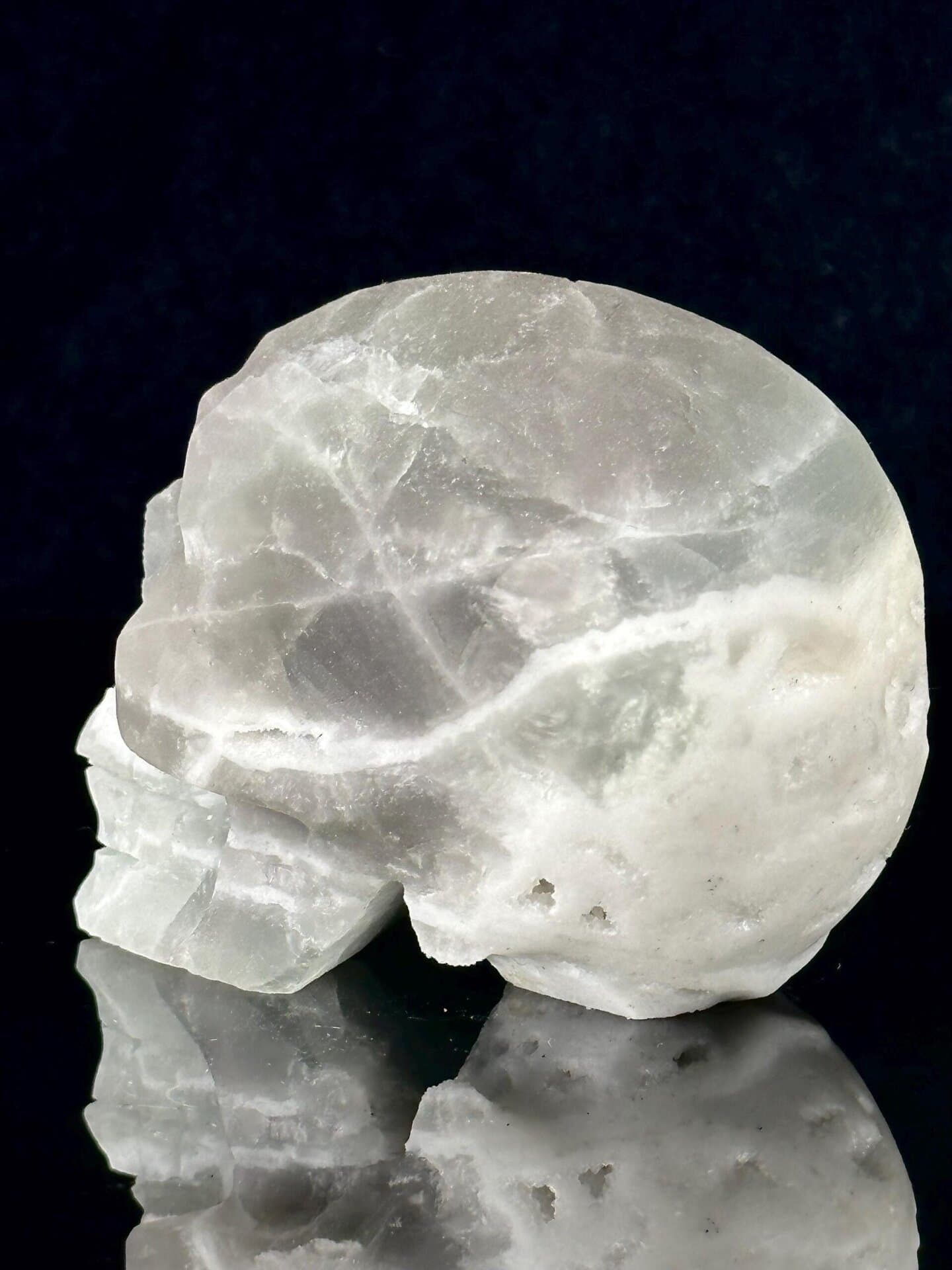 Three-quarter angle of green fluorite crystal skull