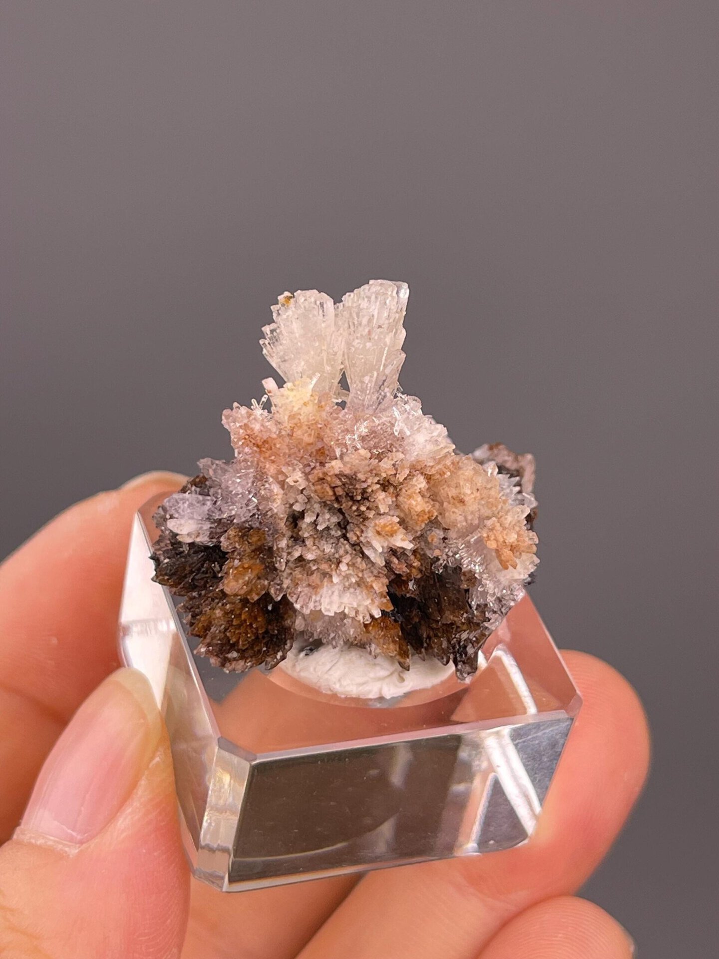 Angled view of peach-white selenite flower