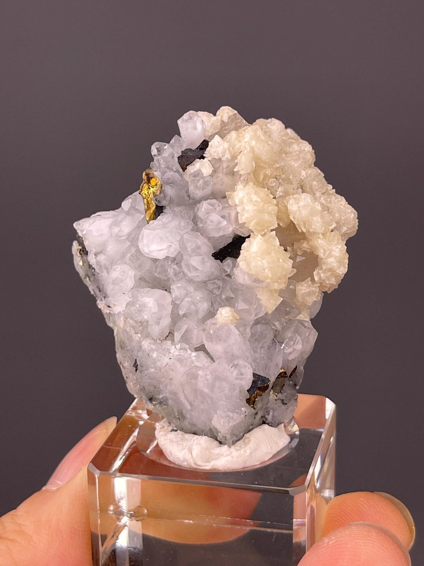 Sharp quartz crystals intergrown with calcite and chalcopyrite, China