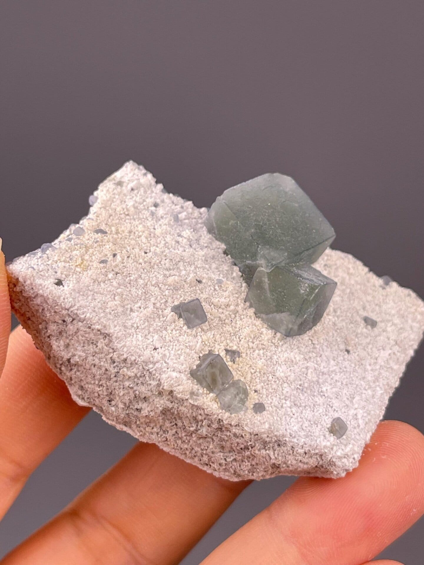Close-up of Morandi green cubic fluorite crystals