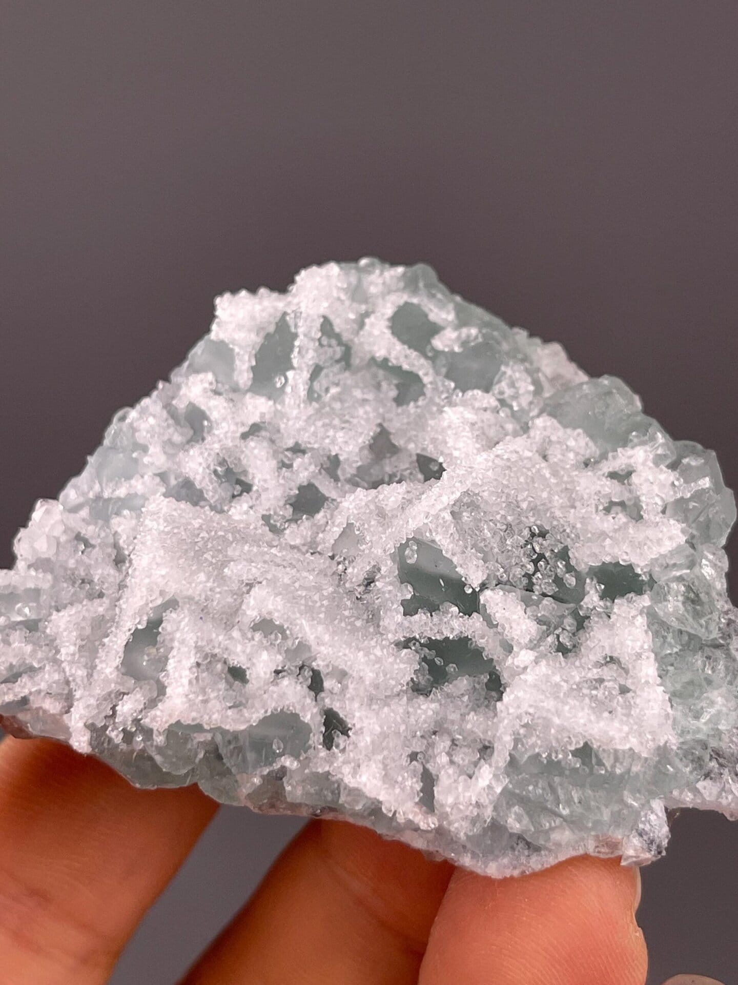Top view of green fluorite with druzy quartz coverage
