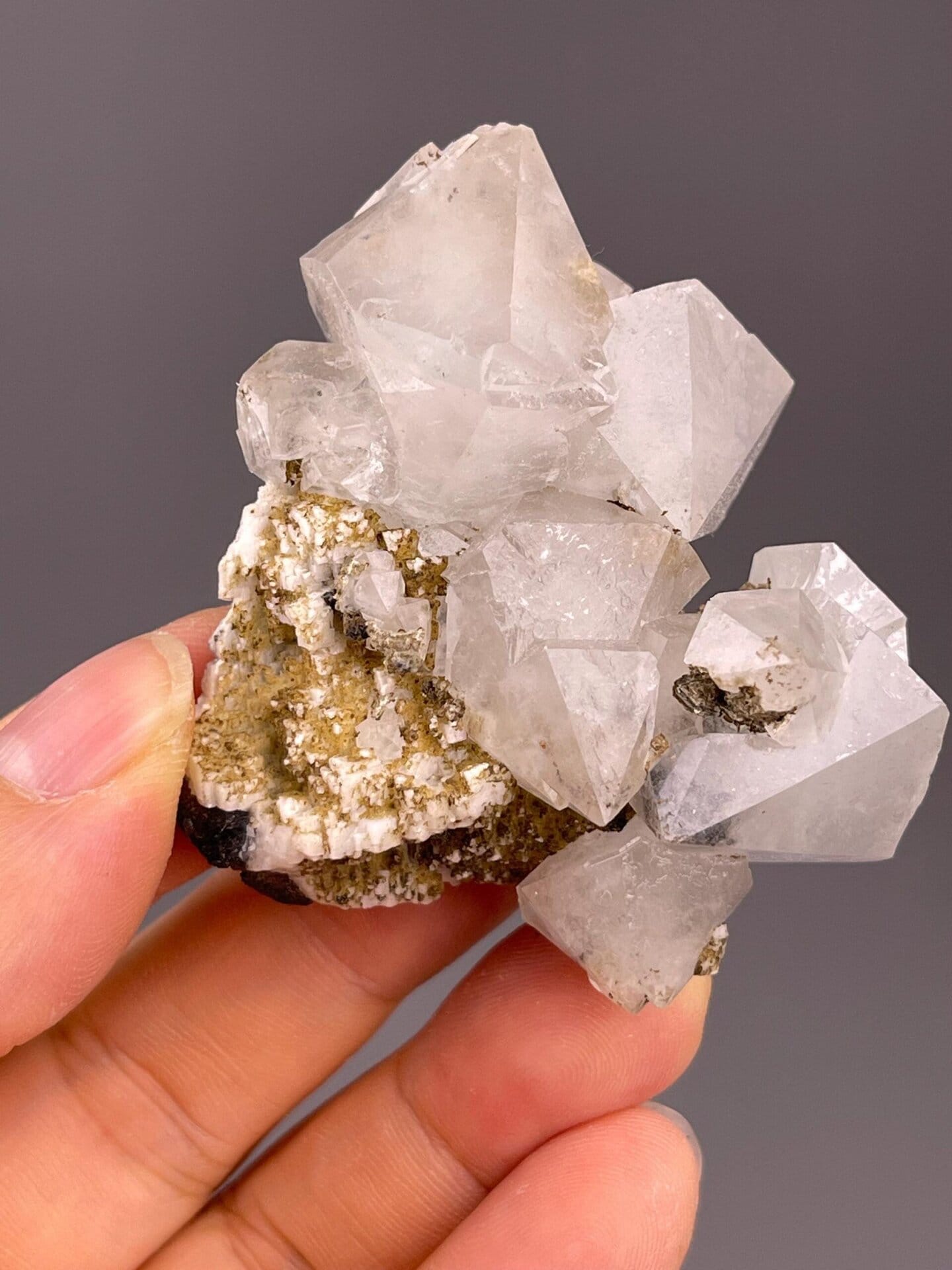 Angled view of white fluorite octahedron