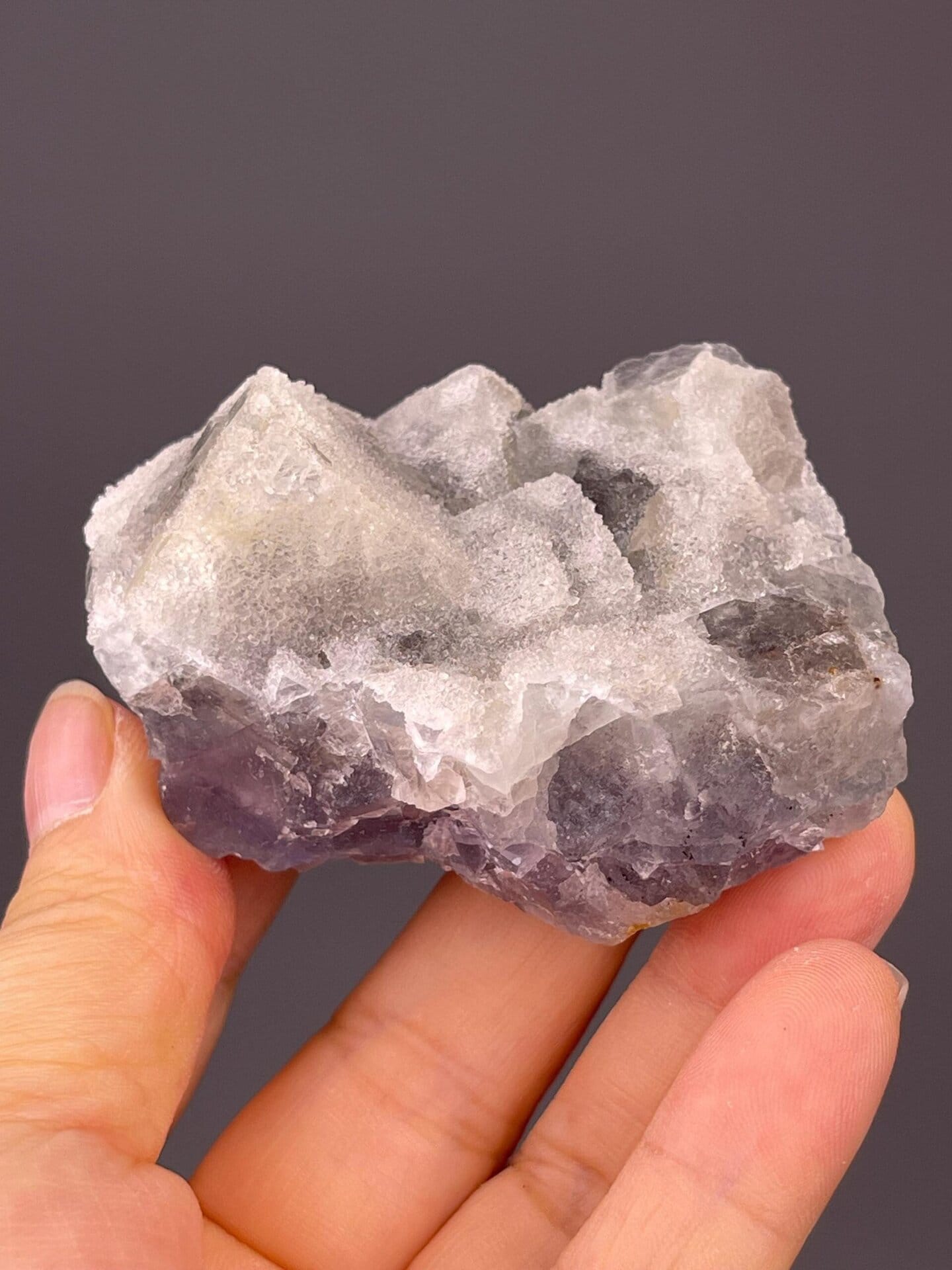 Angled view of etched blue fluorite with sugar coating