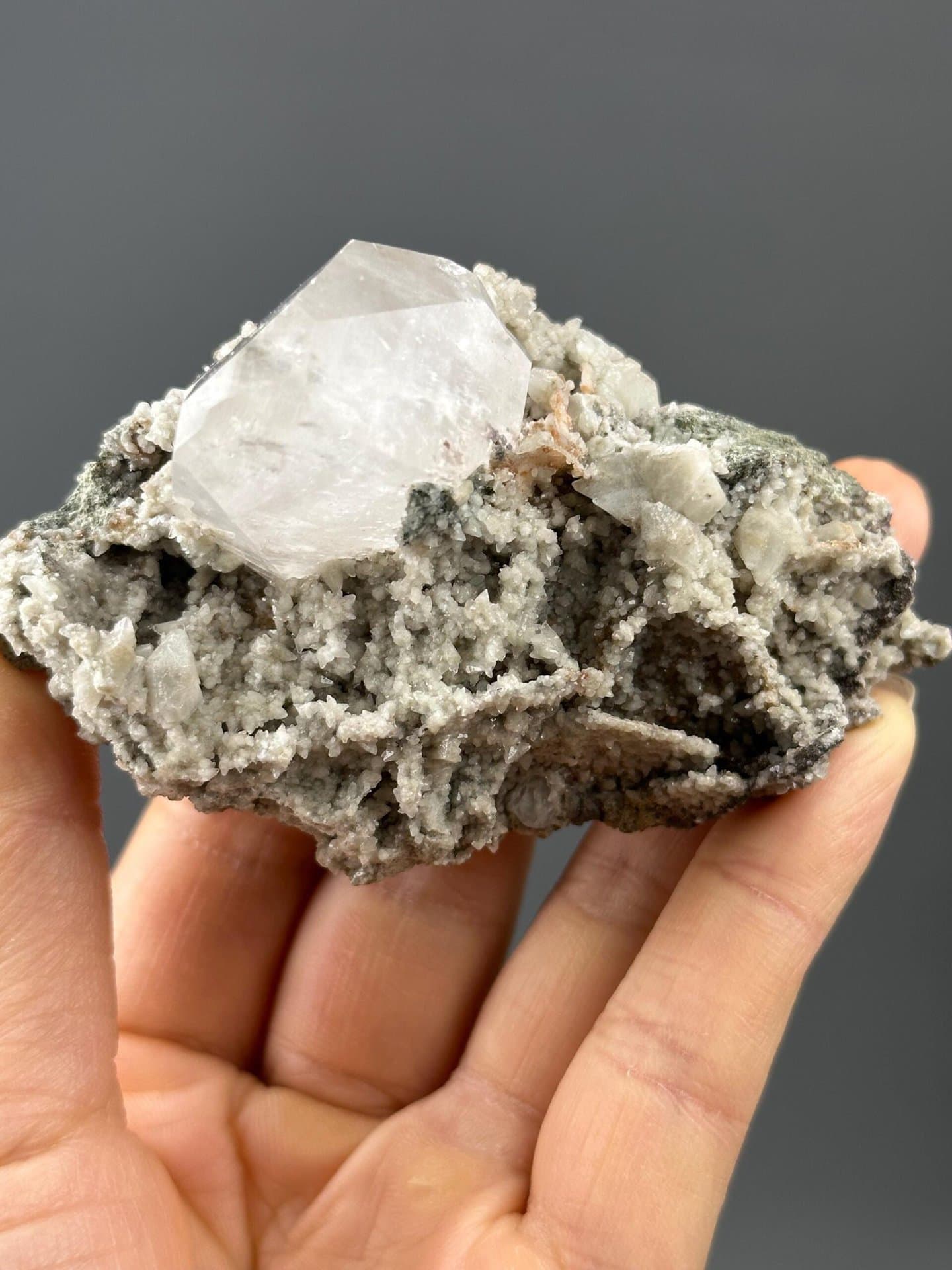 Front view of UV-reactive calcite cluster, 3.4×2×1.8 in