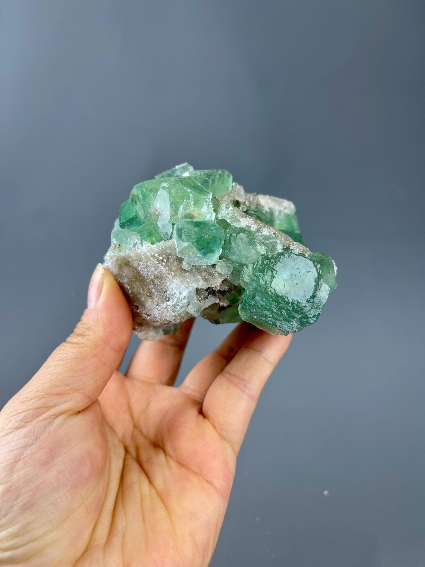 Apple-green fluorite cluster from Xianghuapu Mine, Hunan