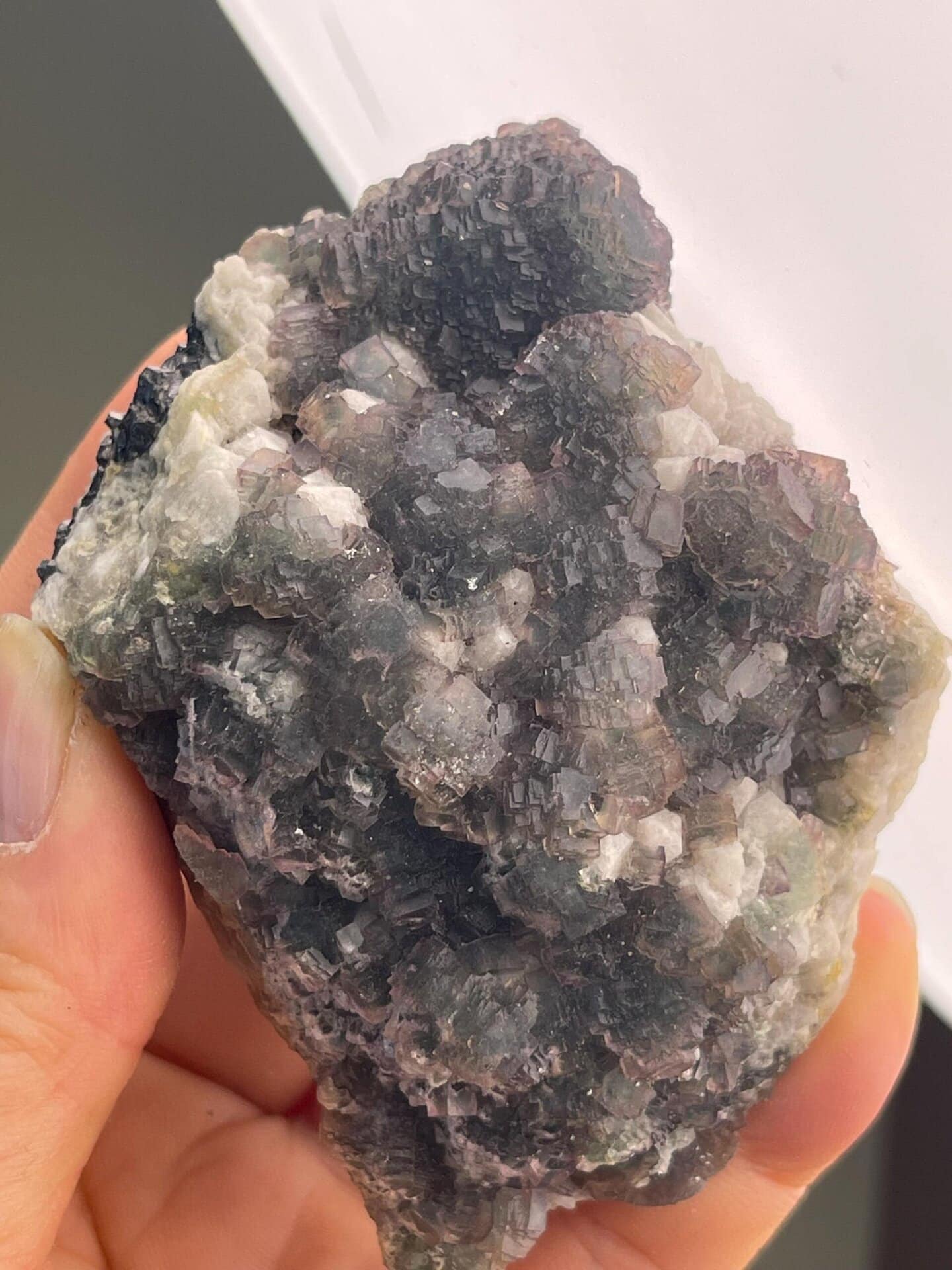 Two-tone fluorite cluster displaying vitreous luster
