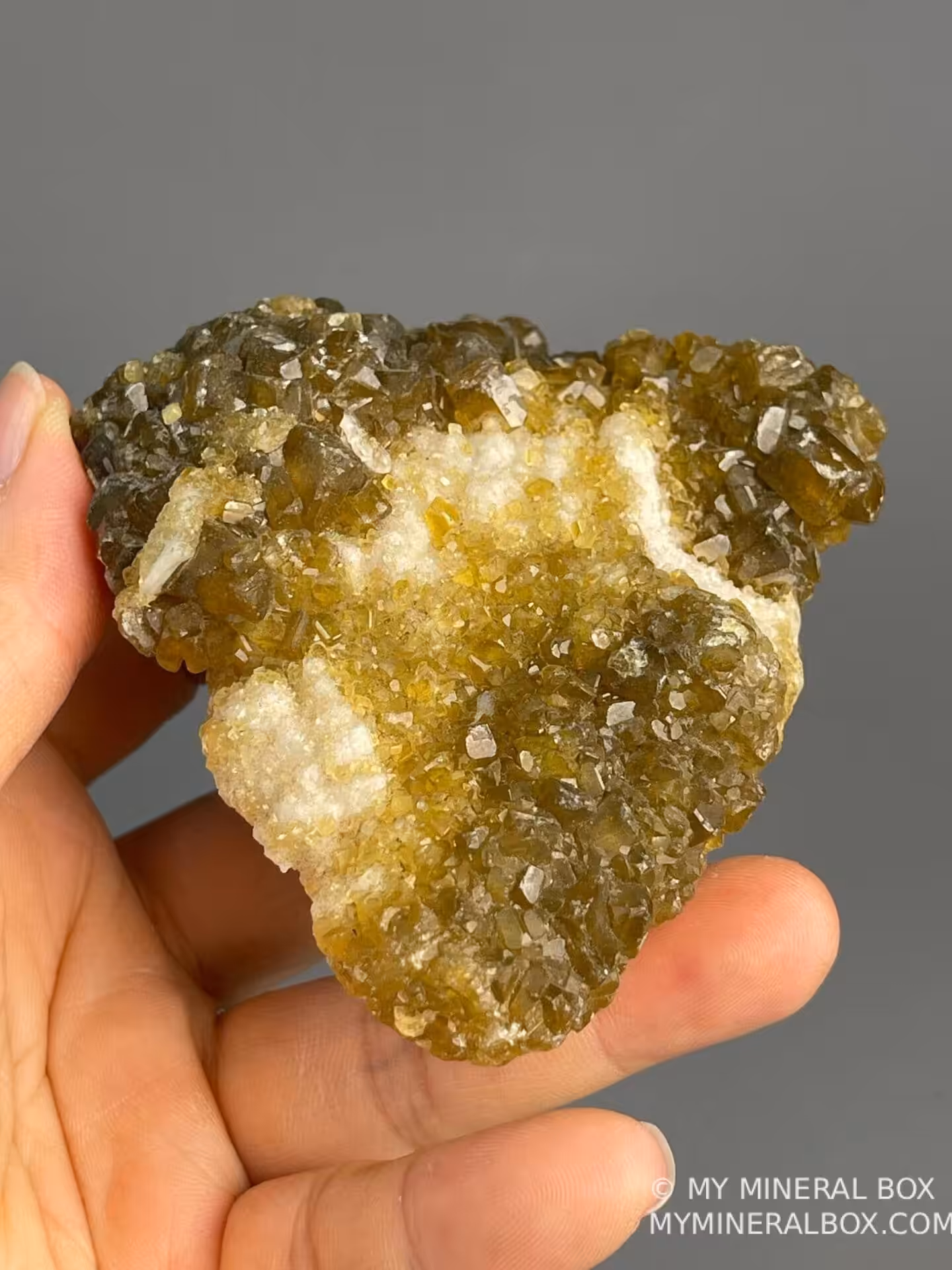 Golden barite crystals complemented by creamy white calcite
