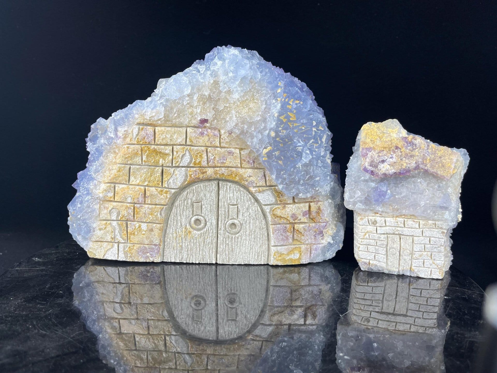 Top view of blue and gold calcite house sculpture set