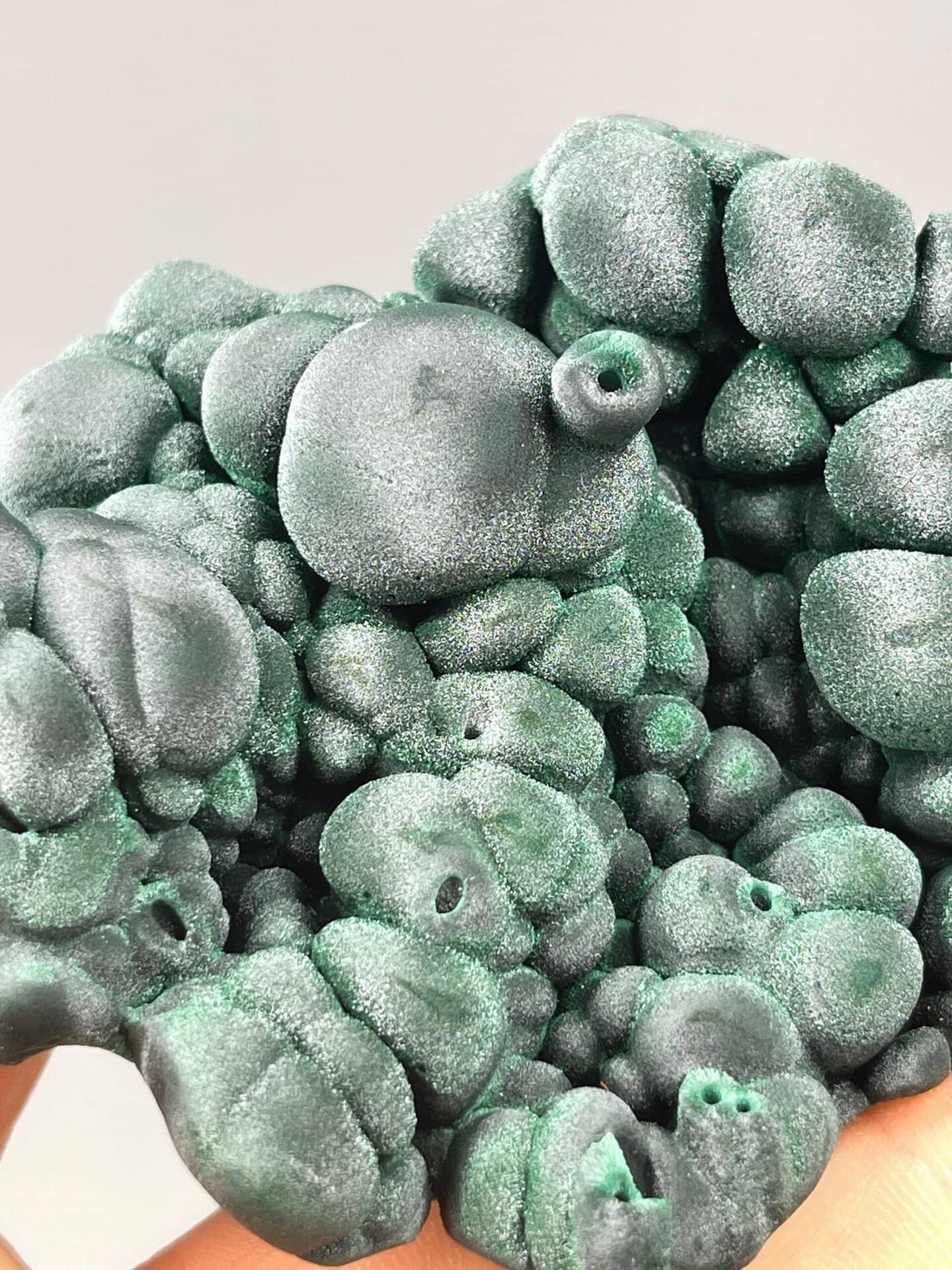 Malachite botryoidal cluster displaying silky luster