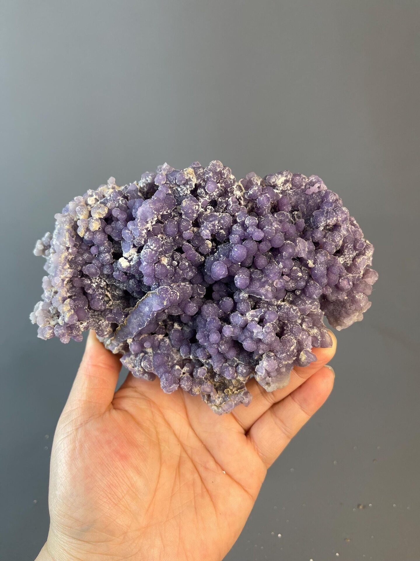Large grape agate cluster displaying waxy luster
