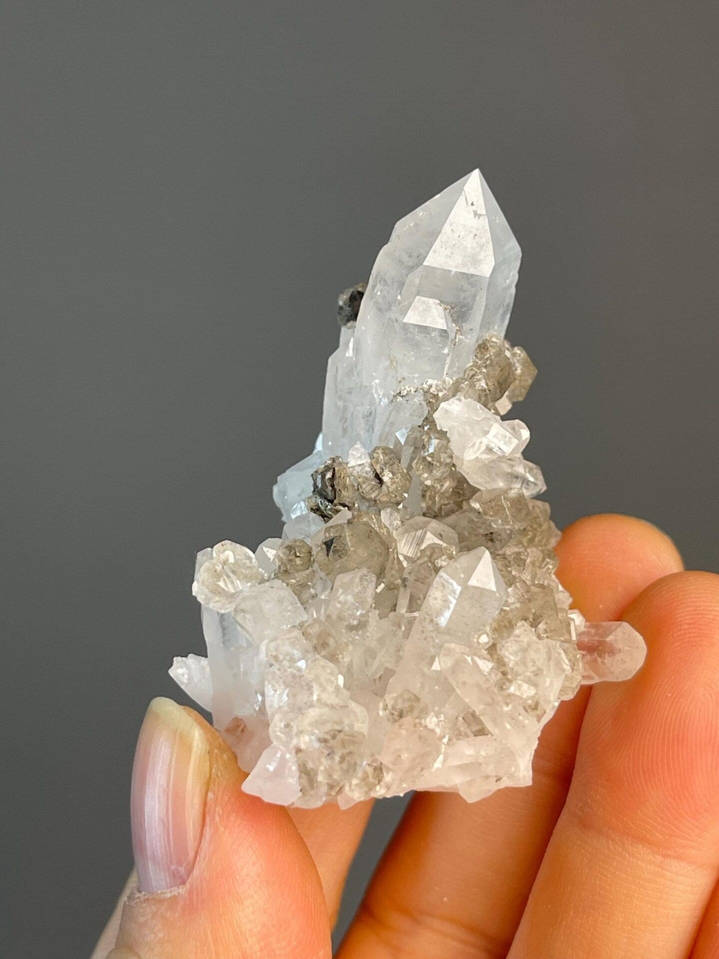 Natural dark coloration of smoky quartz SiO2 tower cluster