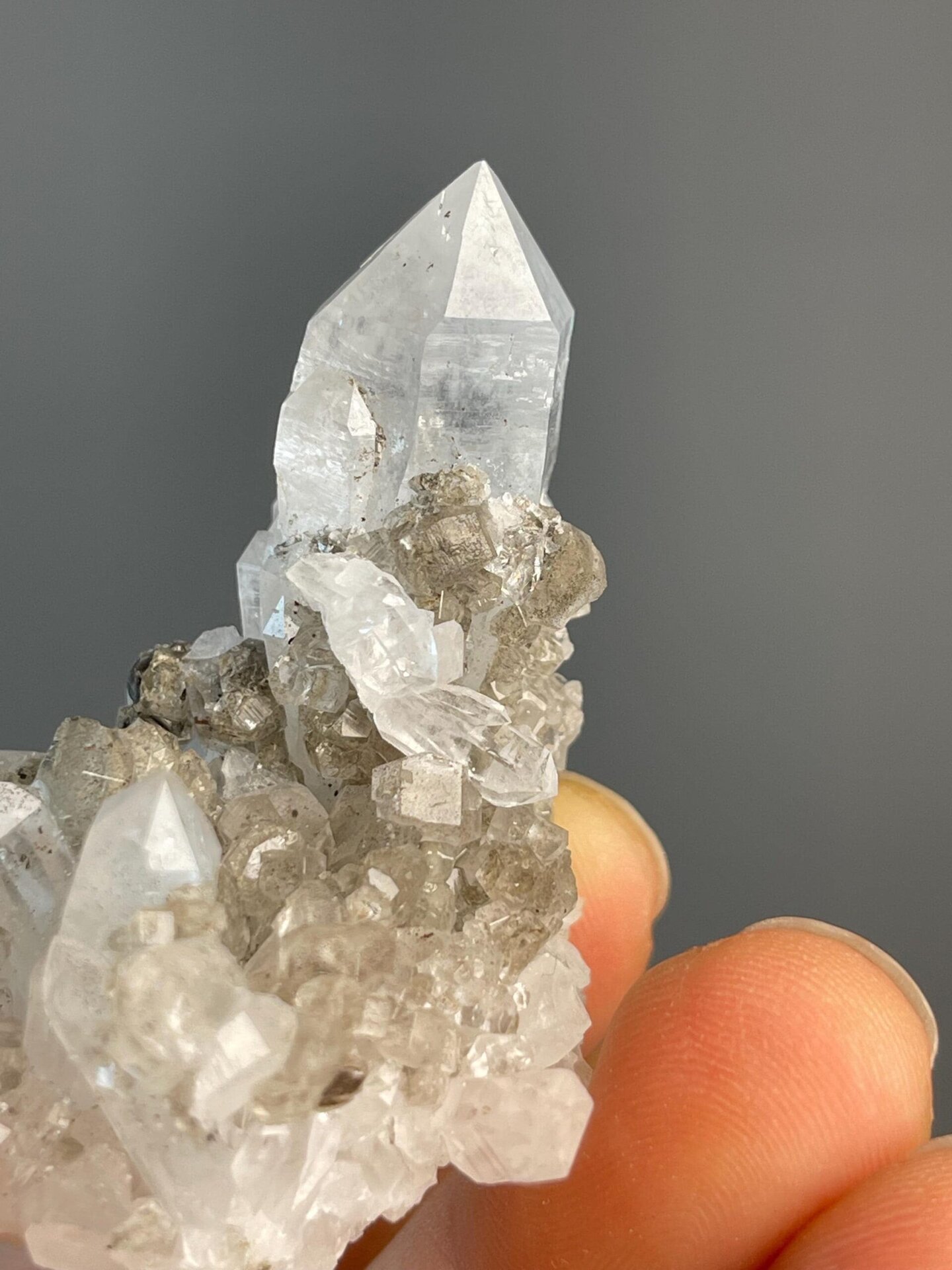 Scale view of 1.8x1.0x1.5 in smoky quartz cluster
