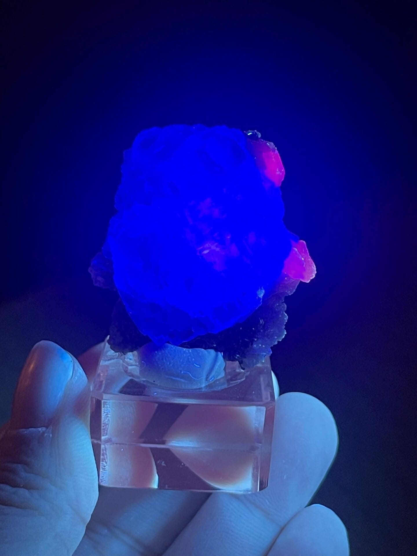 Blue-purple phantom fluorite displaying vitreous luster