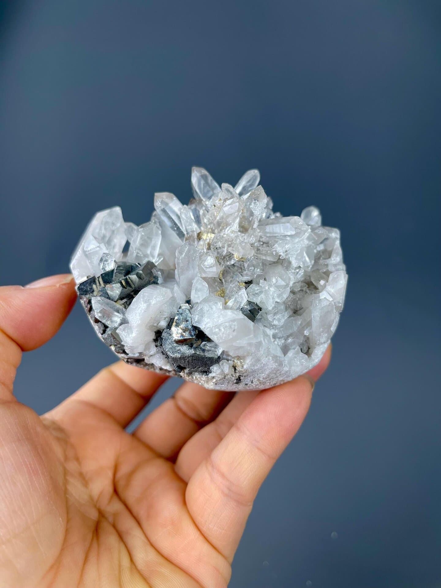 Crystal pyrite geode displaying metallic luster interior