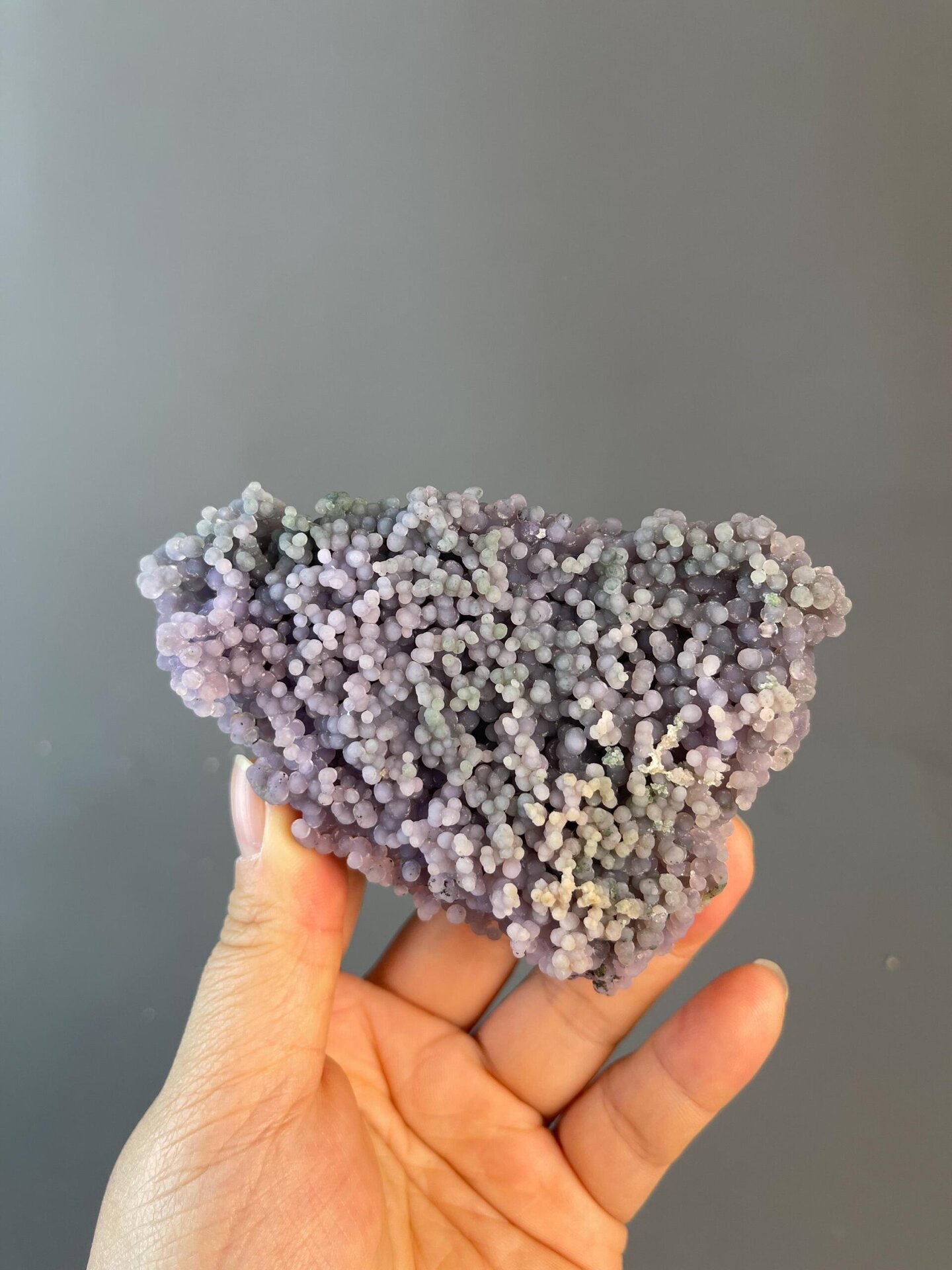 Close-up of grape agate spherical formations in mixed colors