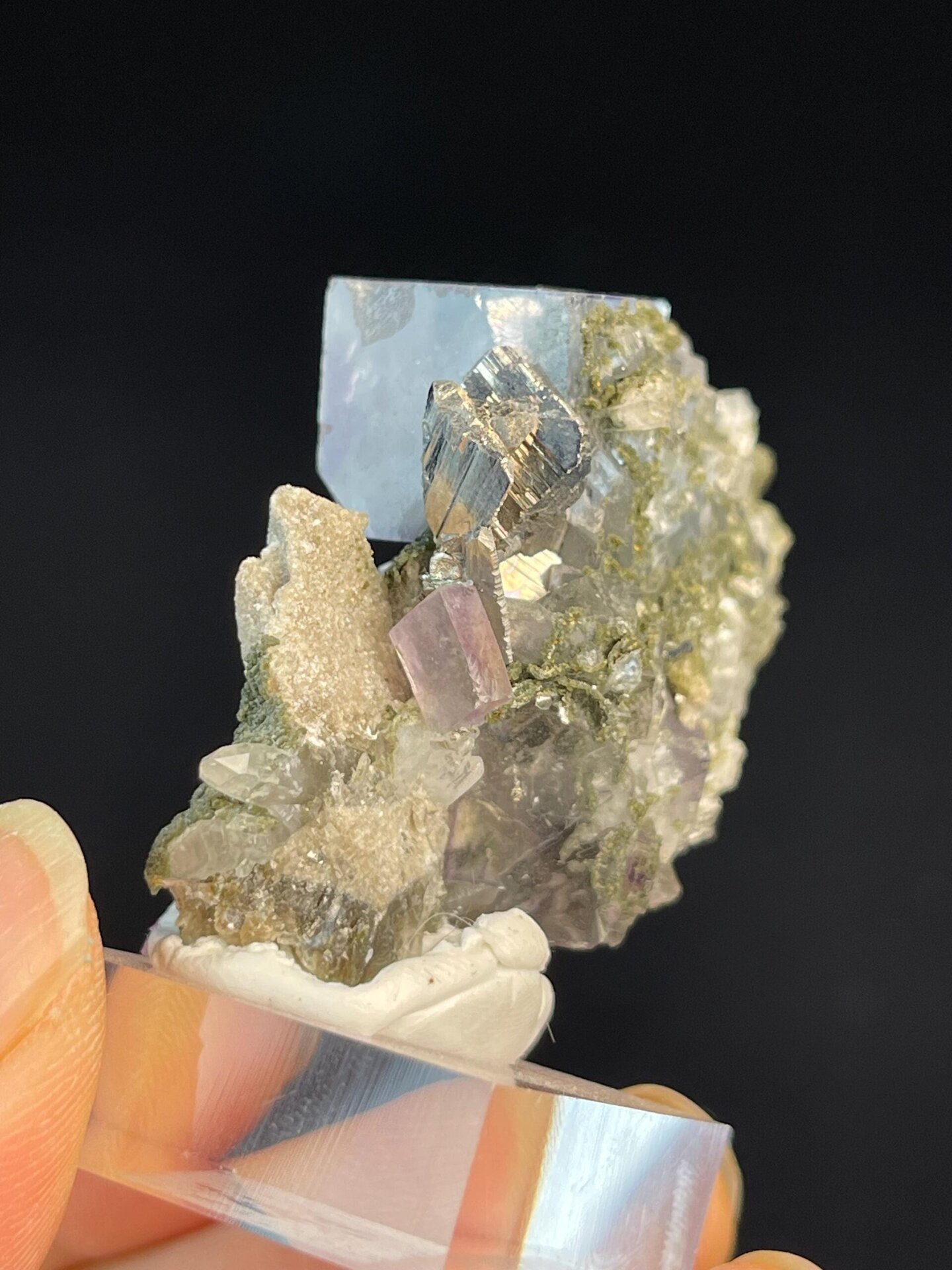 Double cubic fluorite on green base with columnar quartz