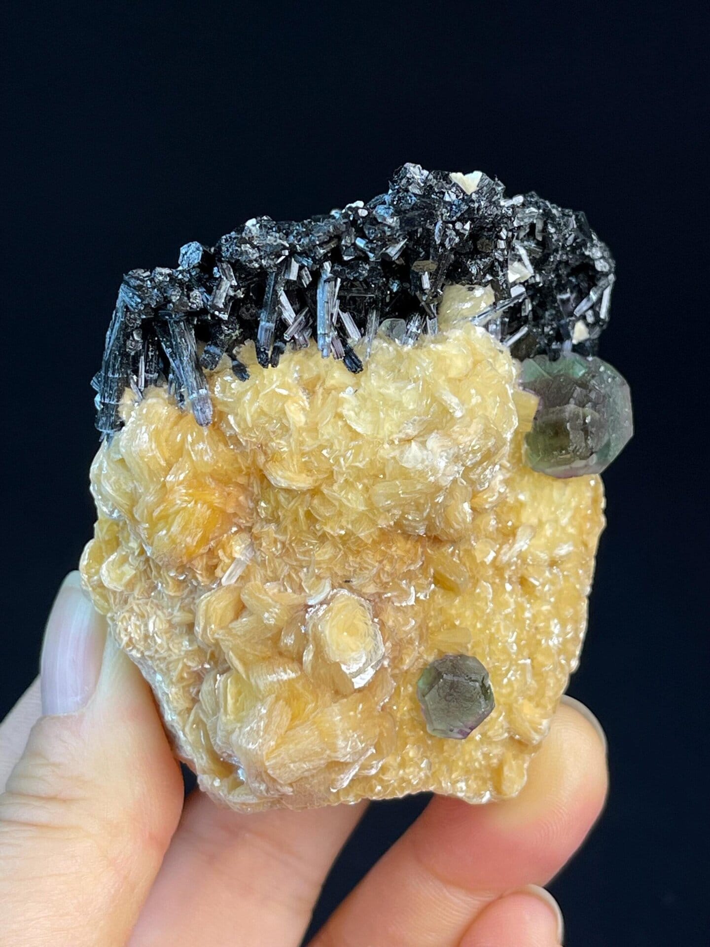 Black tourmaline crystals on calcite with small fluorite, Namibia