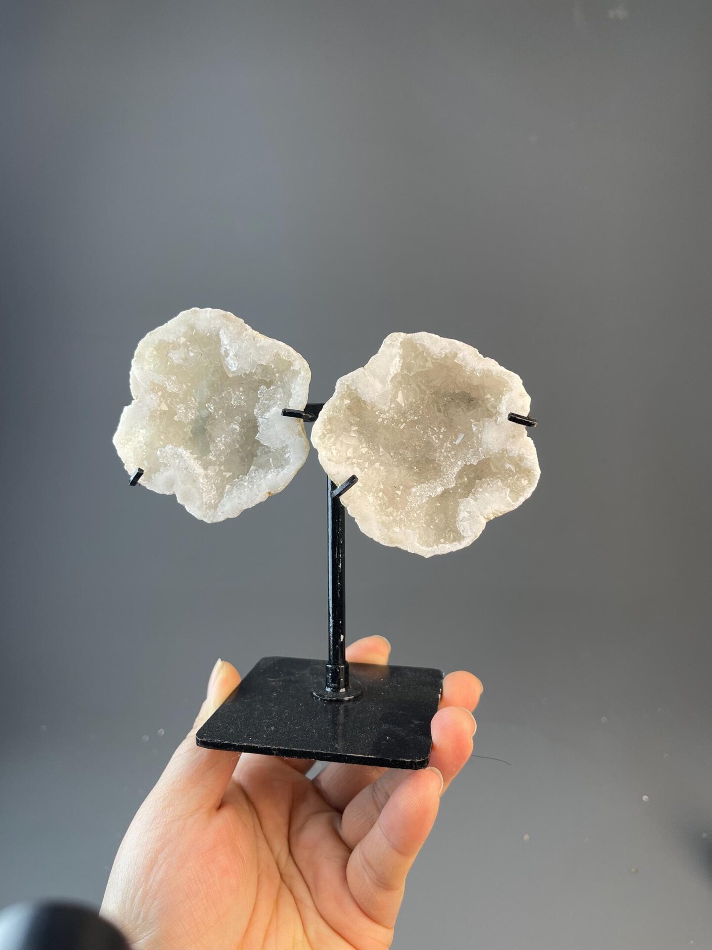 Split geode halves revealing sparkling druzy quartz interior
