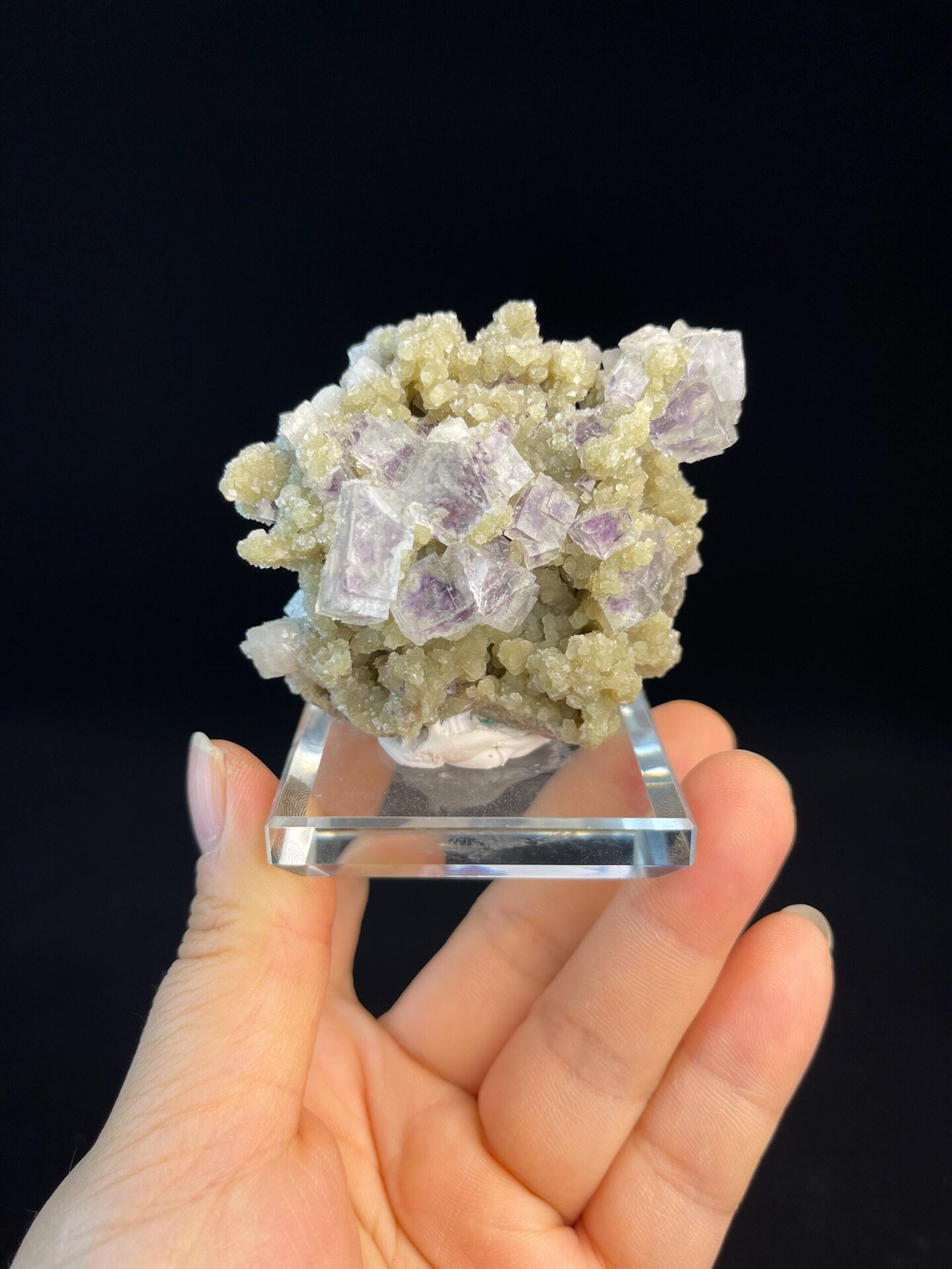Close-up of purple phantom zones within transparent fluorite