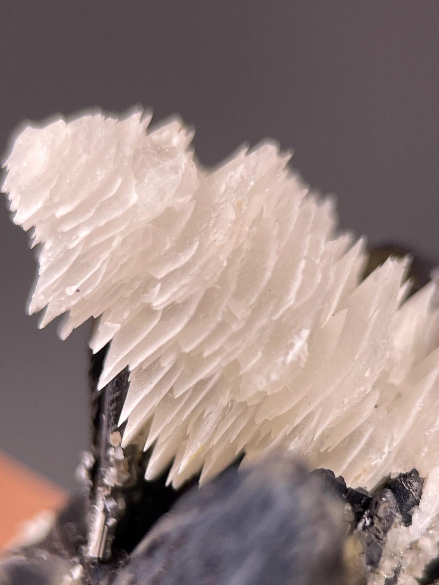 Scale view of 1.8x1.5x1.3 in cassiterite calcite cluster