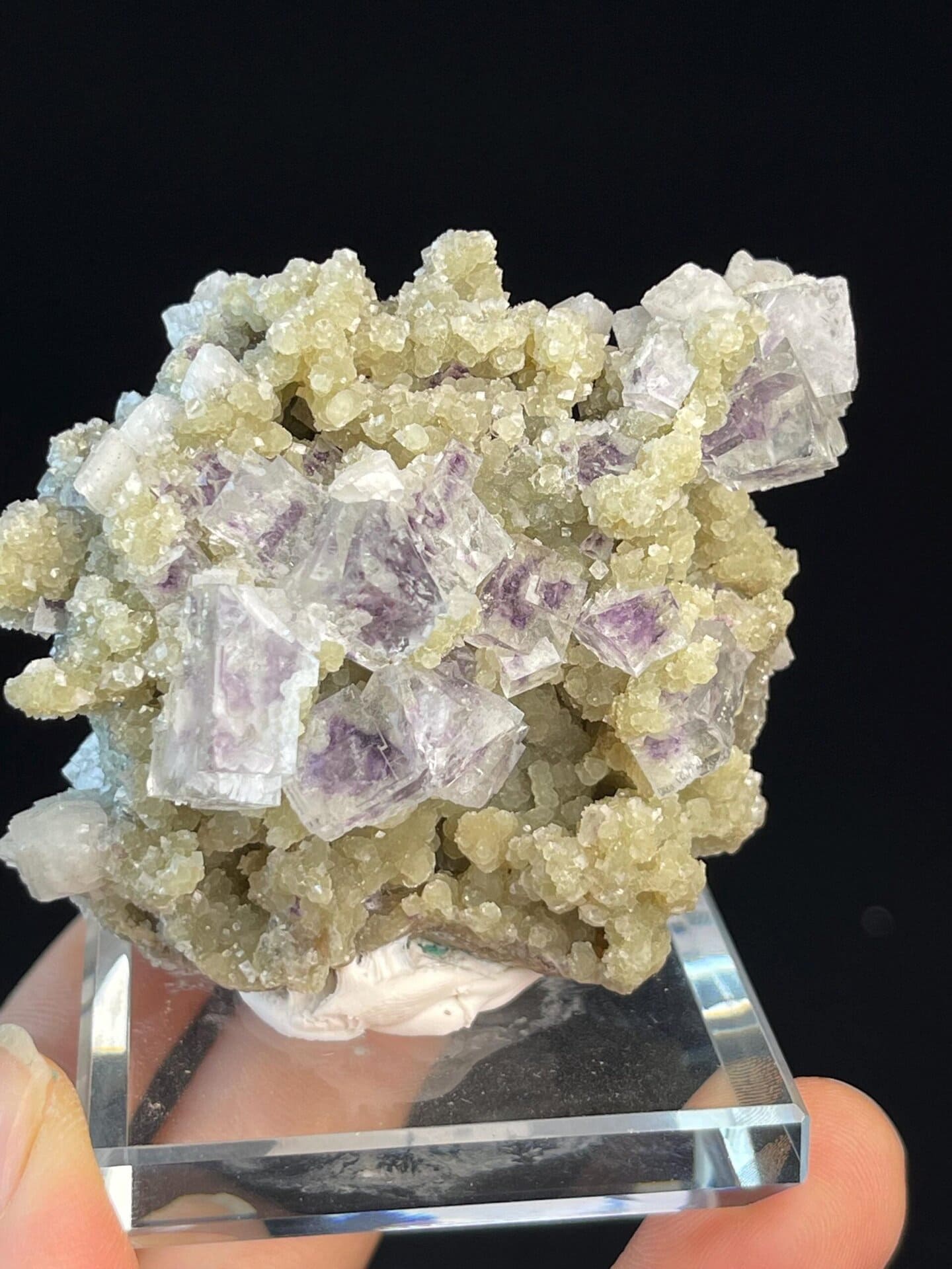 Top view of purple phantom fluorite on green base, YGX