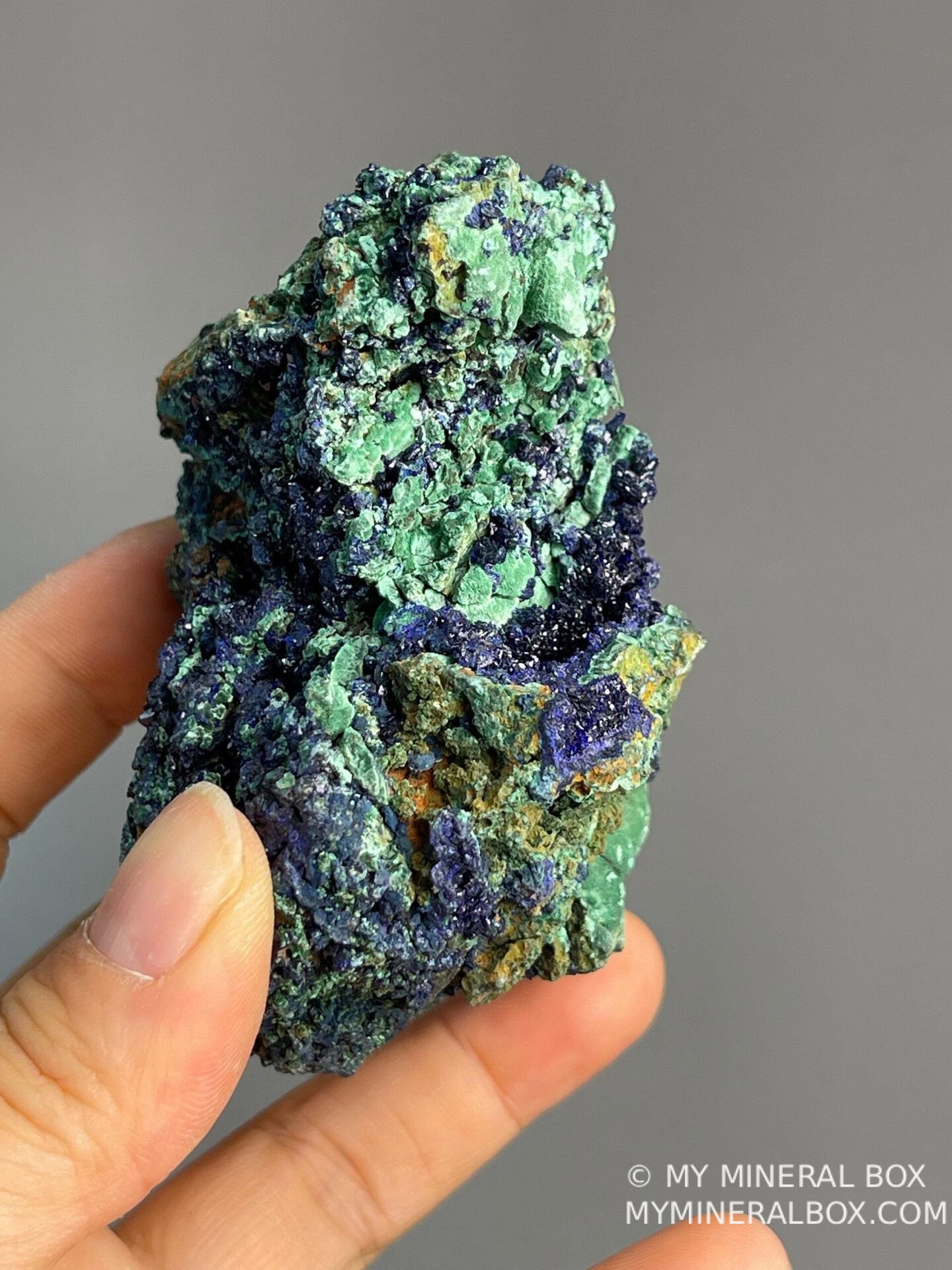 Close-up of vibrant blue azurite and green malachite patterns