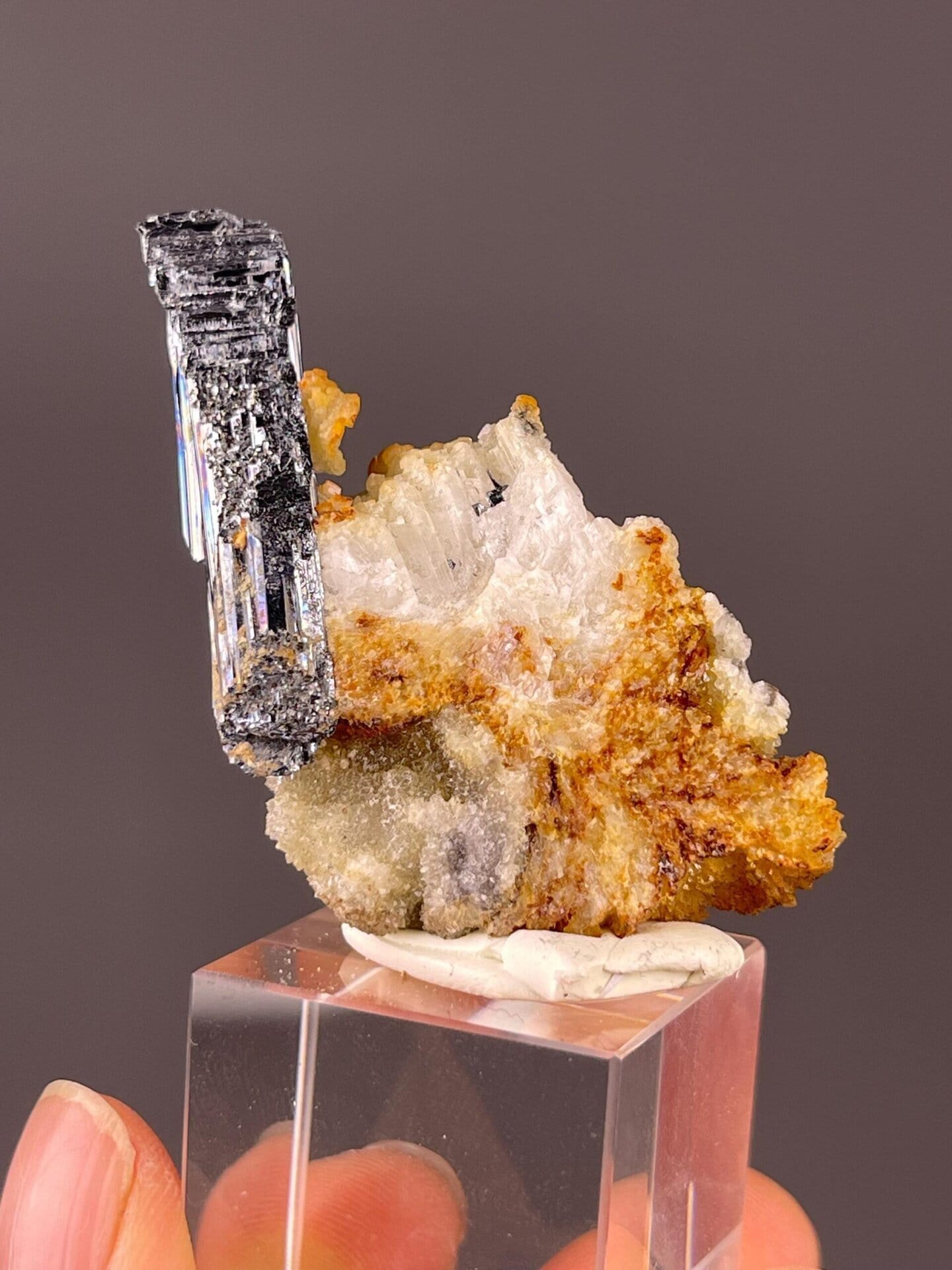Close-up of prismatic stibnite habit on natural matrix