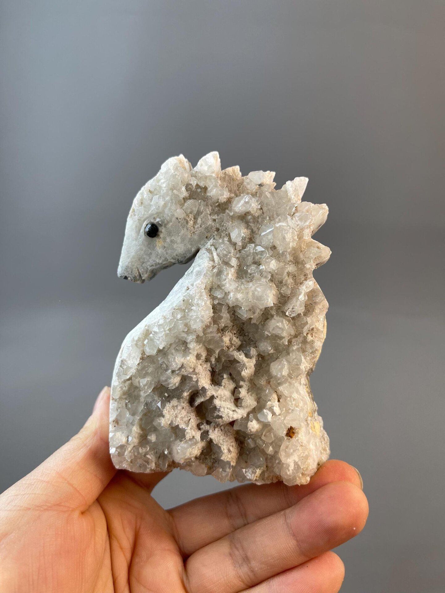 Ocean-inspired quartz seahorse sculpture, hand-carved