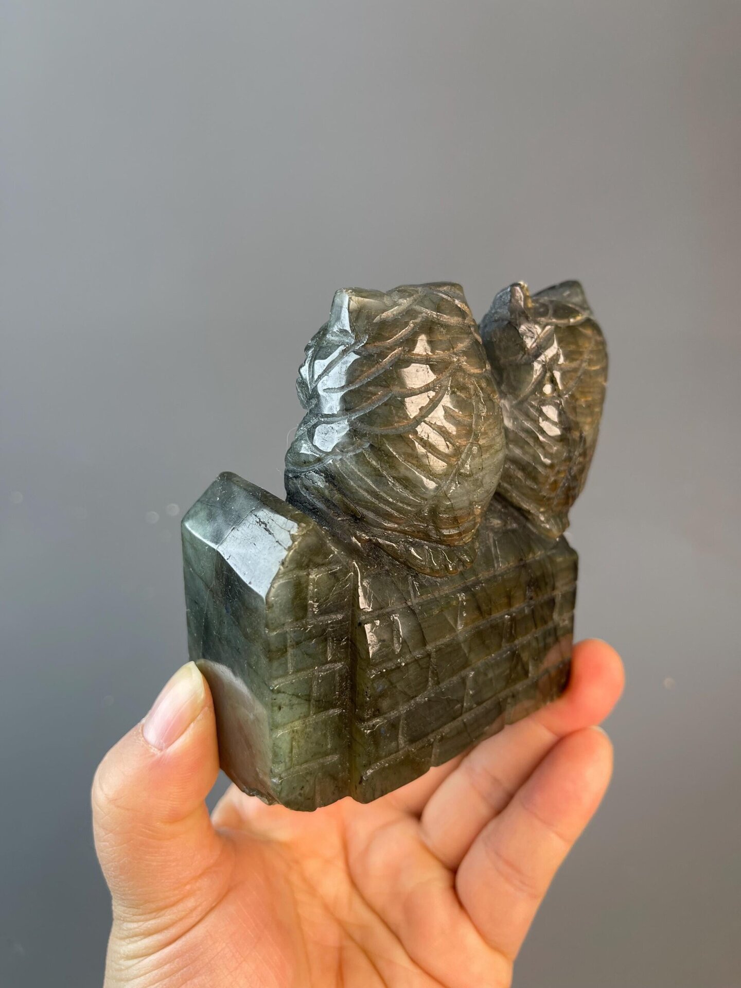 Angled view of labradorite owl showing full iridescence