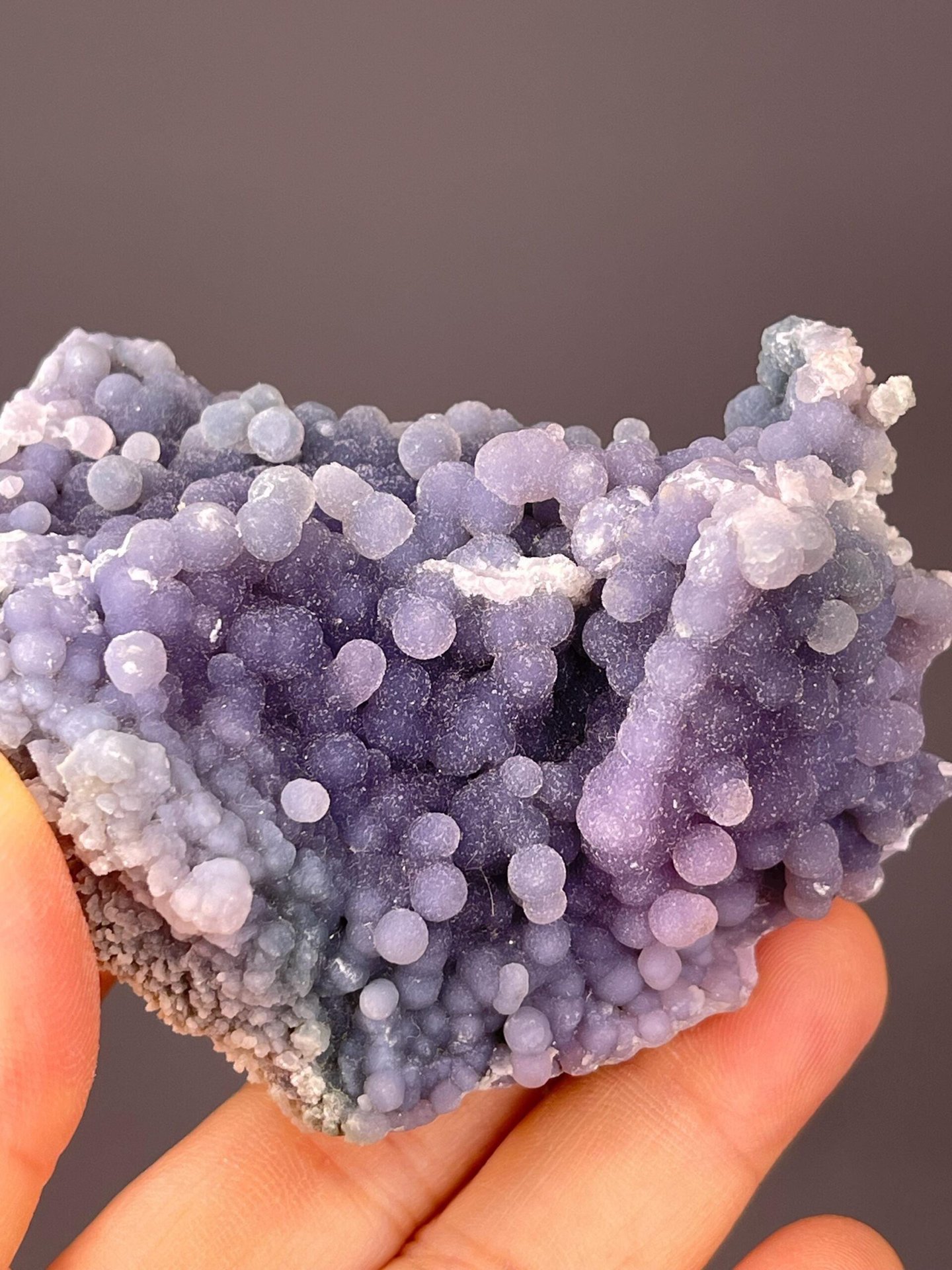 Close-up of silky starlight shimmer on grape agate spheres