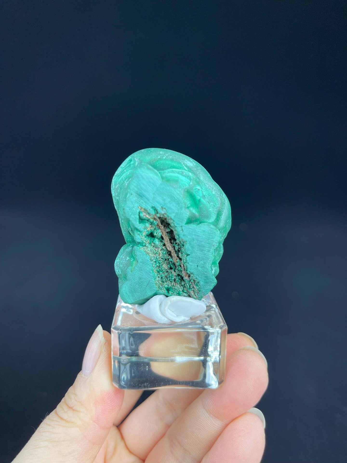 Side view of dual-surface malachite specimen from Congo