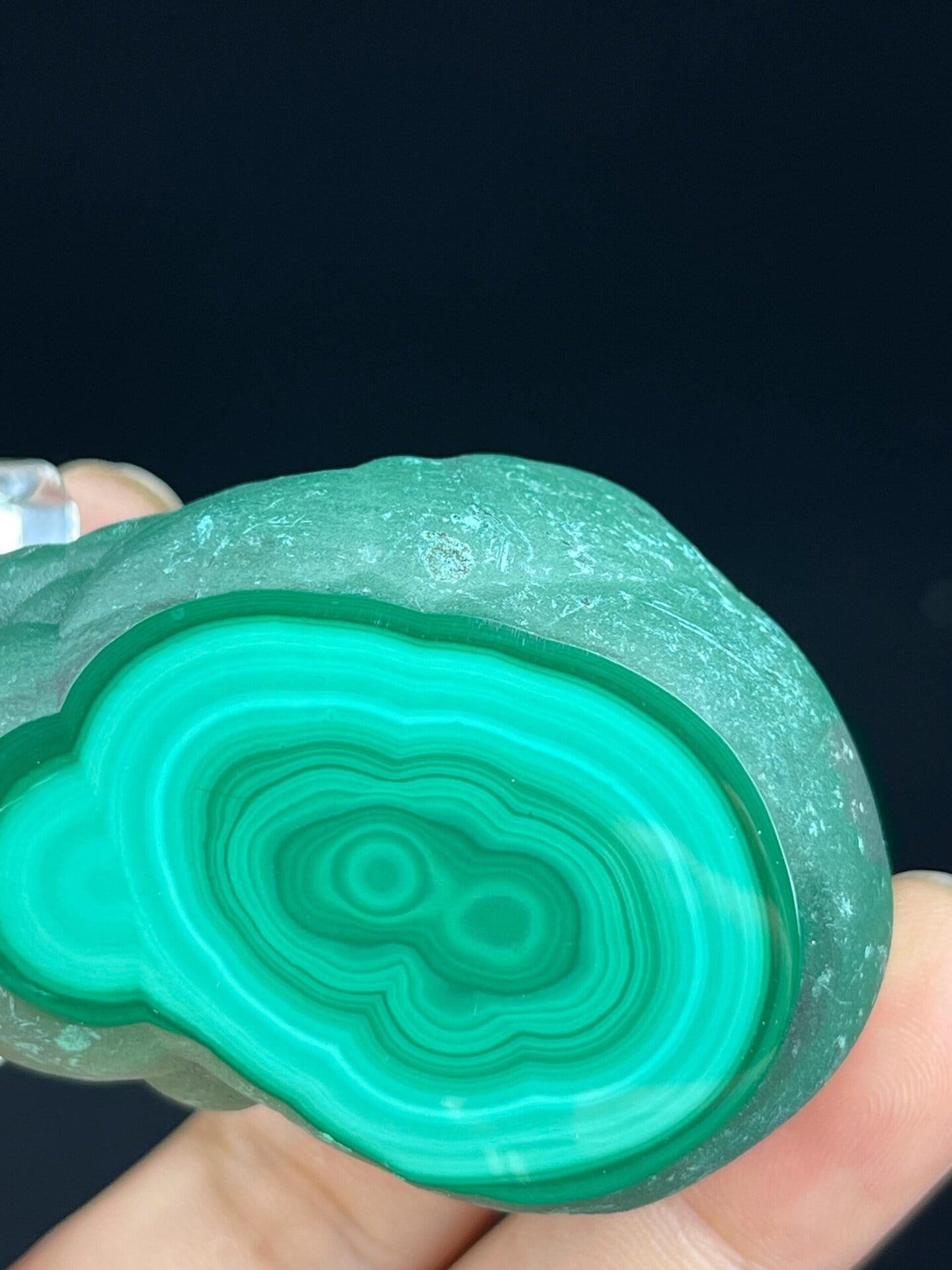 Top view of polished and raw malachite, Republic of Congo