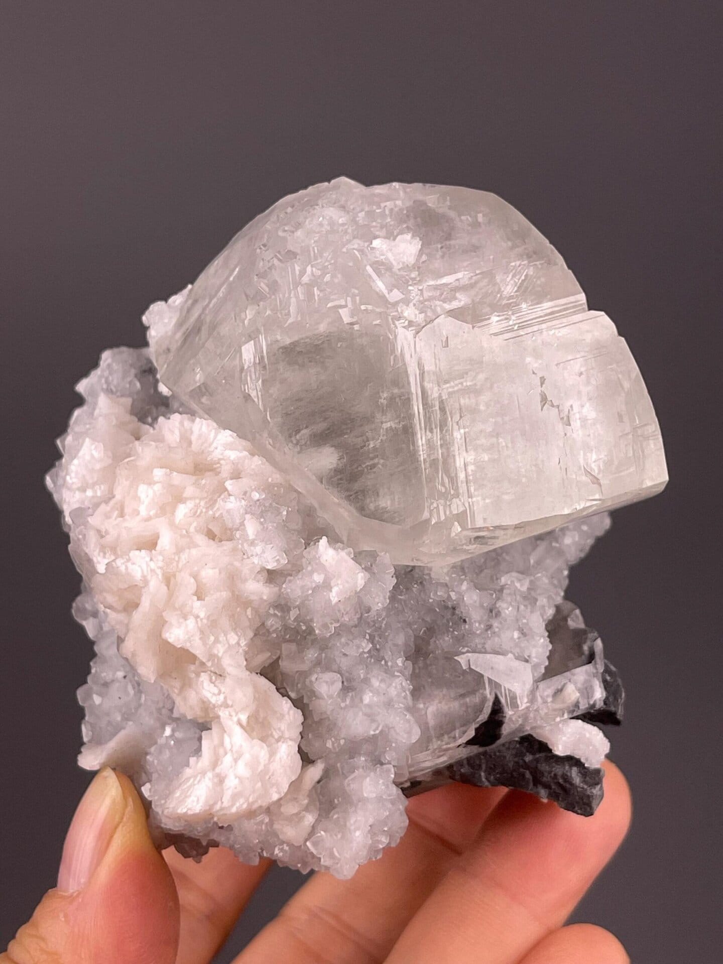 Translucent calcite tower anchored to natural matrix, Daye