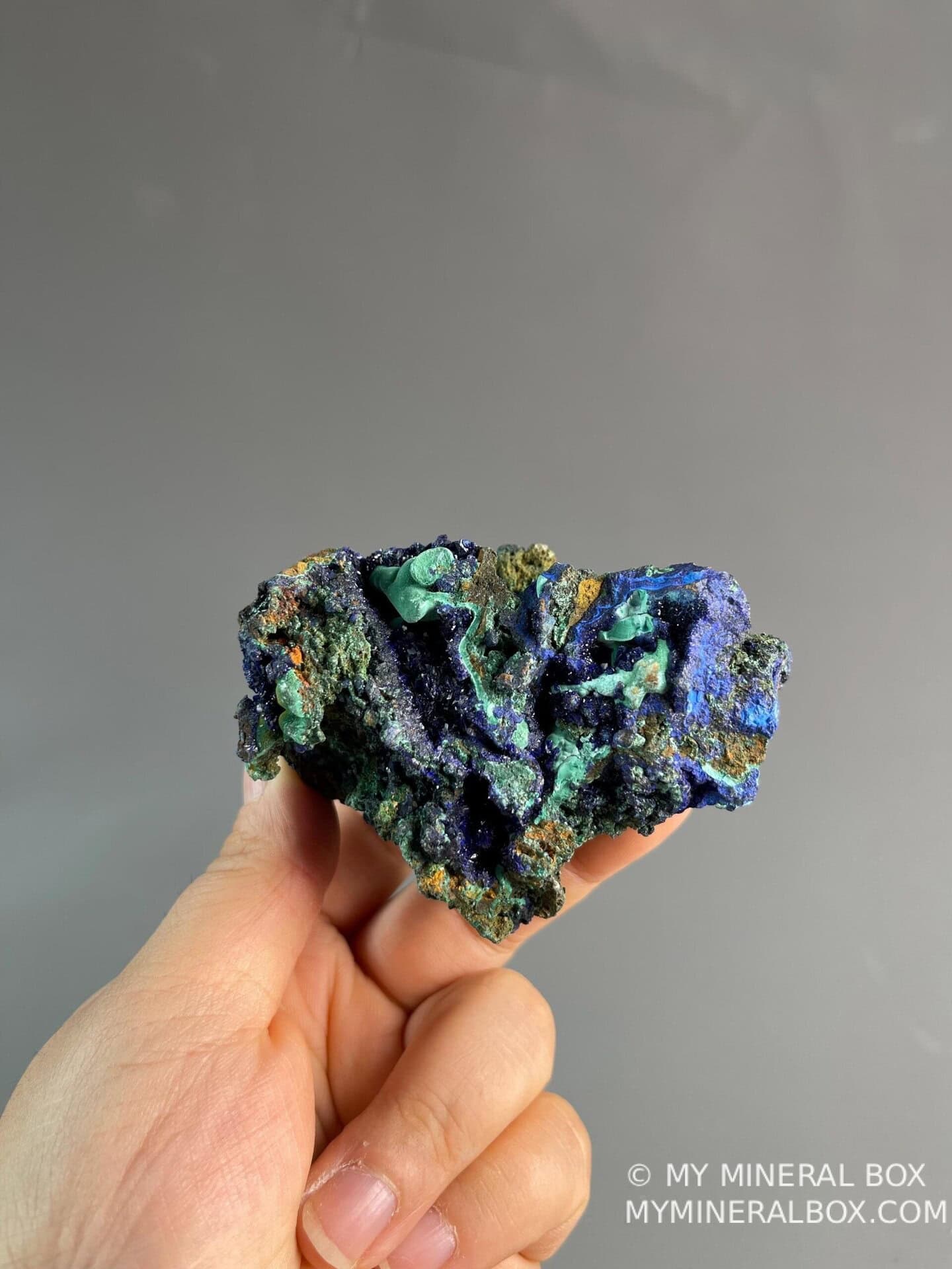 Striking blue azurite crystals against green malachite matrix