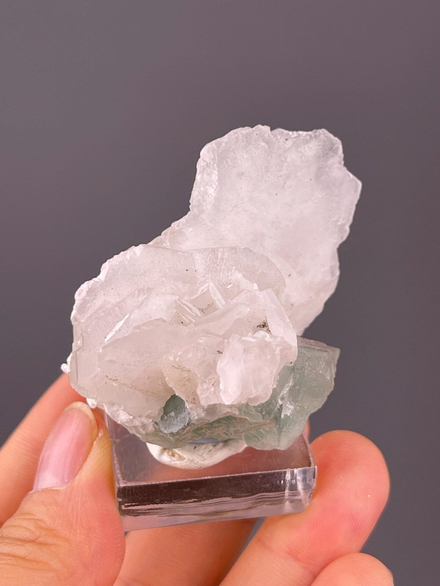 Translucent green fluorite with calcite mineral association