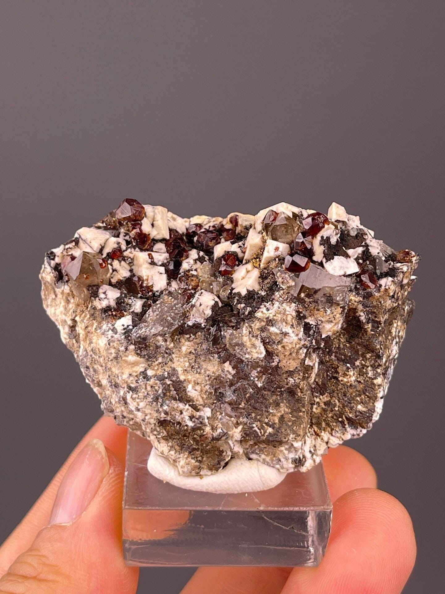 Garnet with feldspar and smoky quartz from Fujian, China