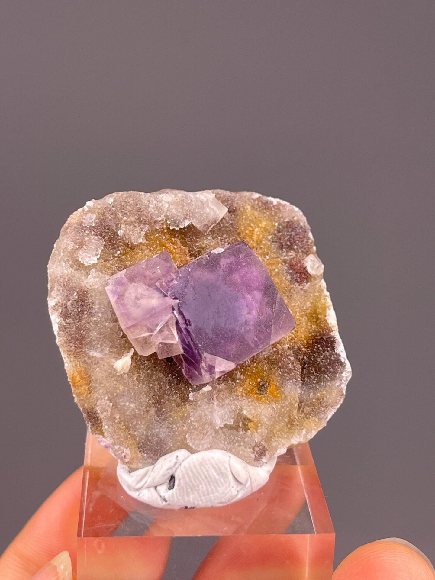 Purple fluorite showing phantom frame as crystal growth record