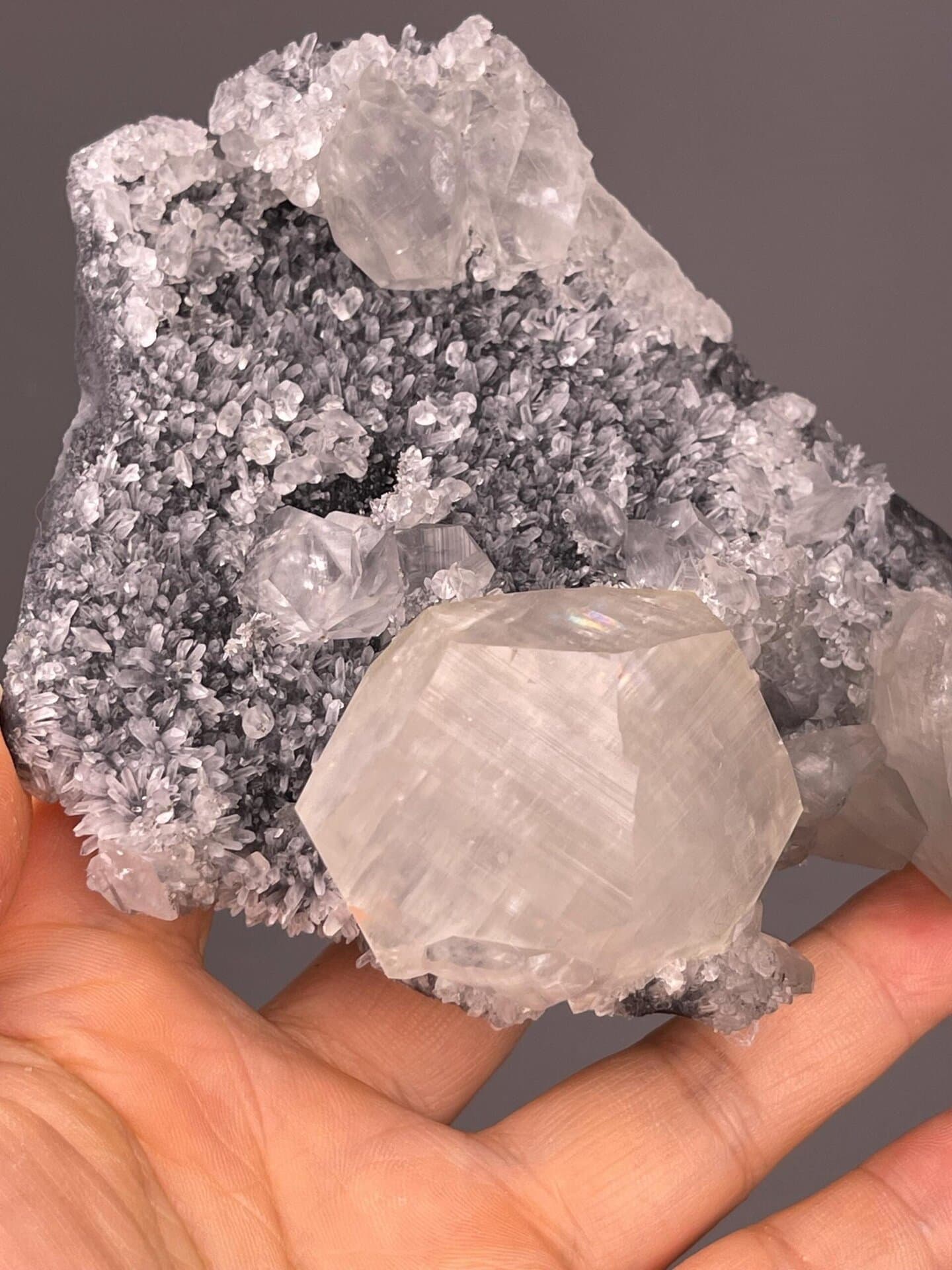 Rare triangular calcite habit with bright vitreous luster