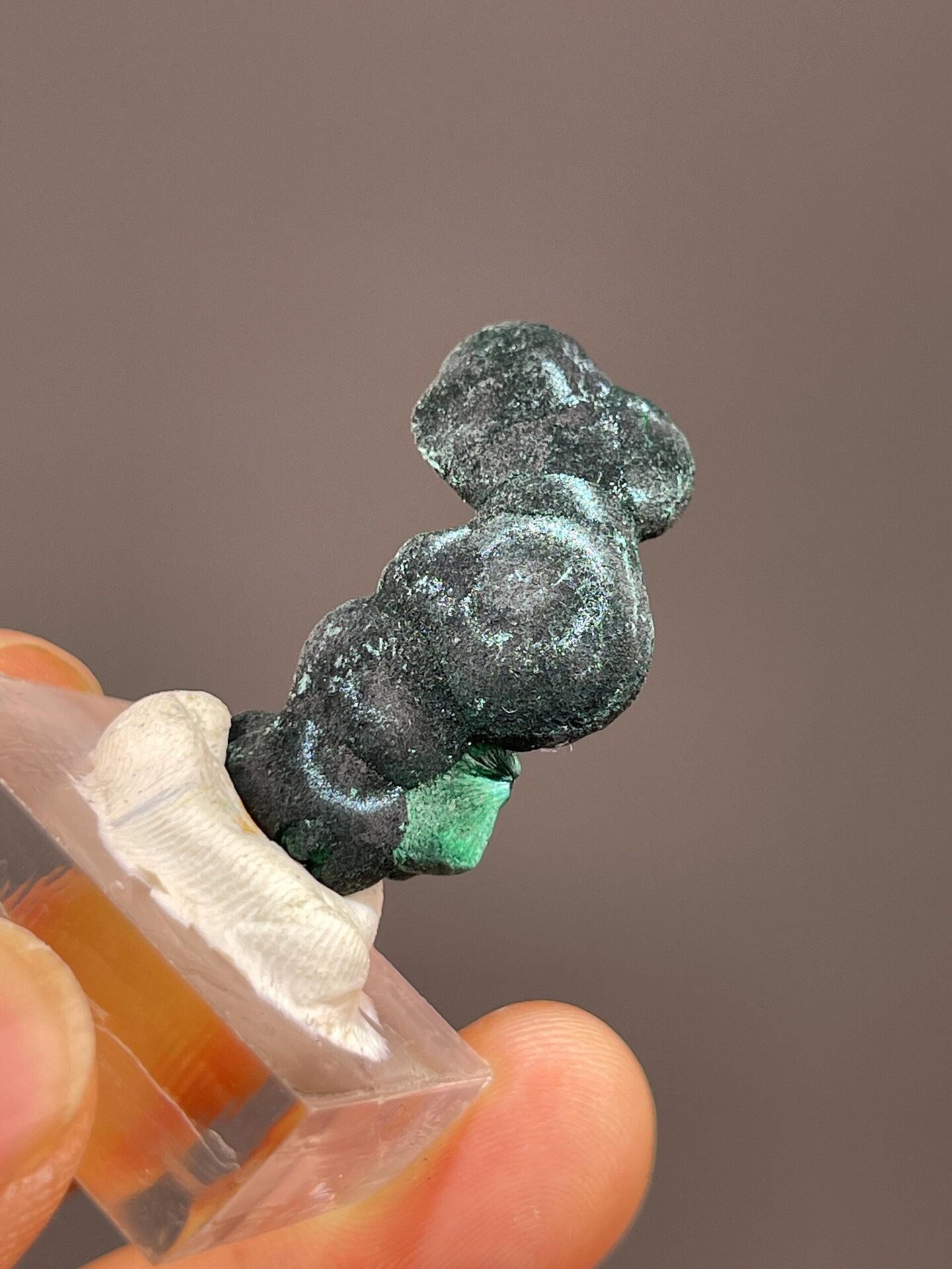 Natural malachite surface with velvet-like crystal texture