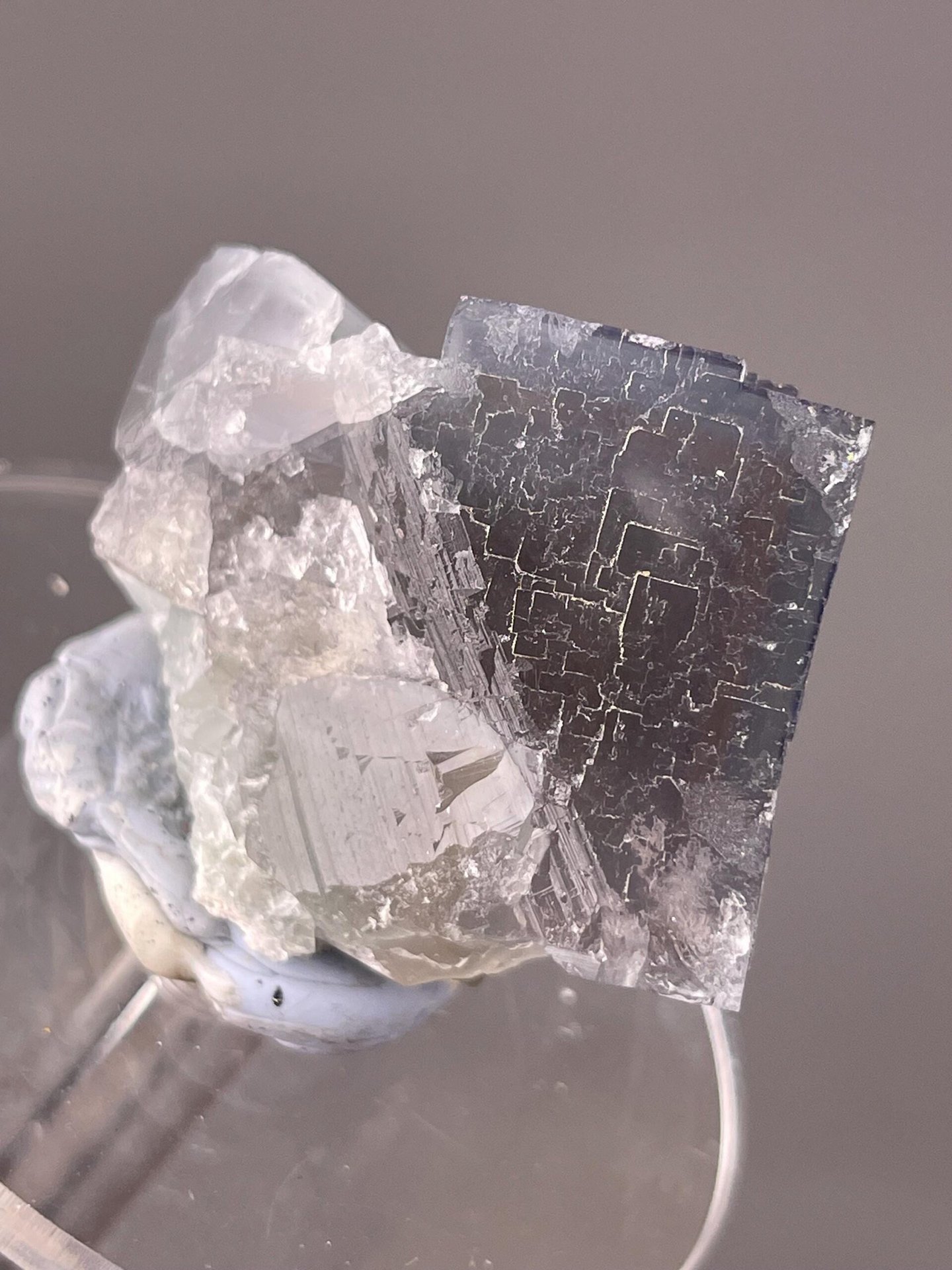 Deep etch pattern detail on purple-blue fluorite cube