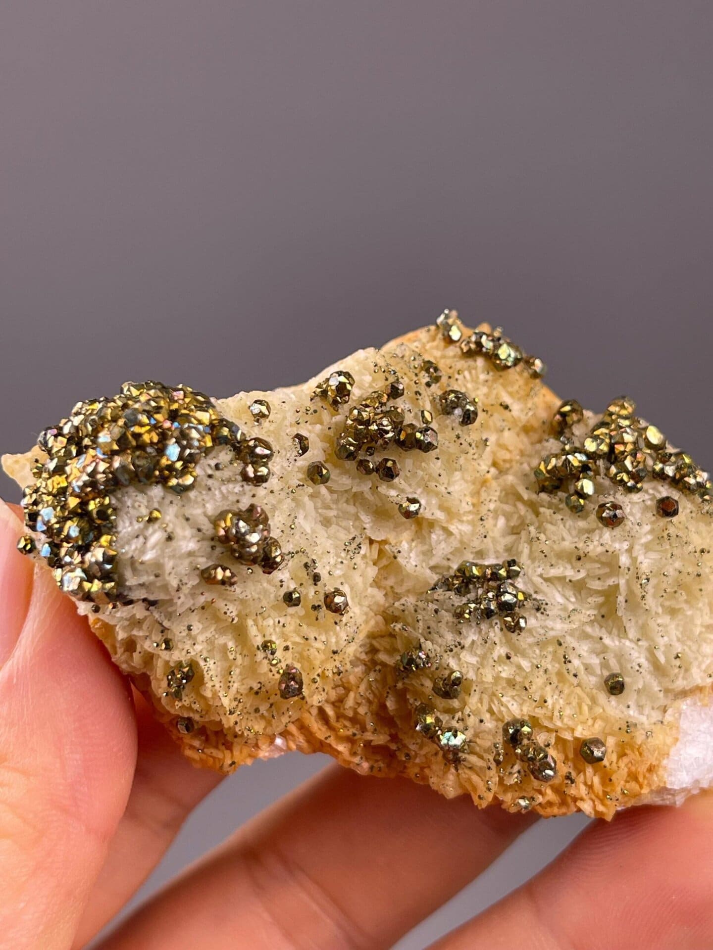 Brassy pyrite crystal faces with chalcopyrite detail