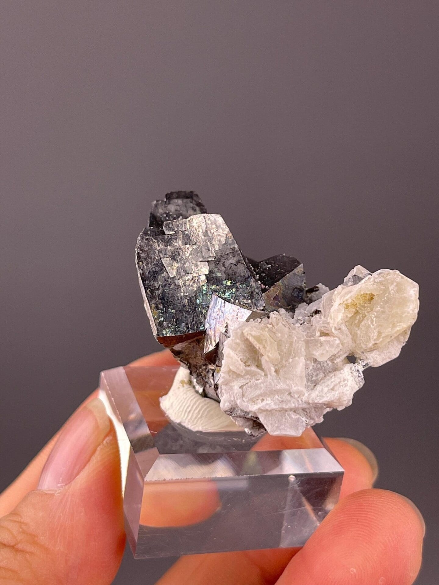 White quartz and calcite matrix with arsenopyrite