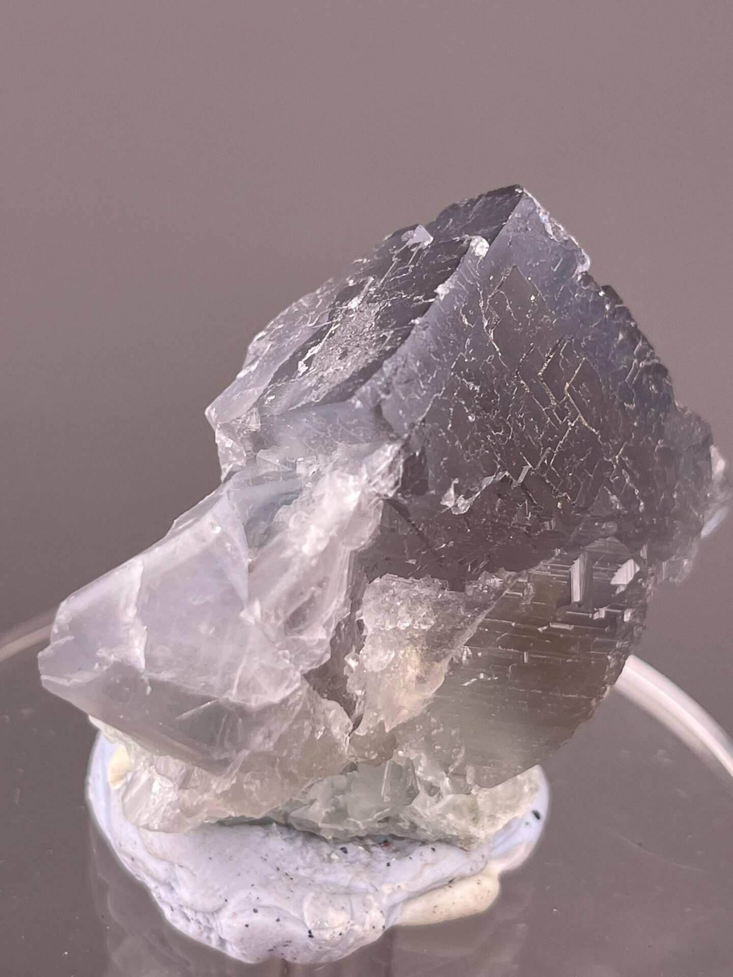Purple and blue coloration on etched fluorite crystal