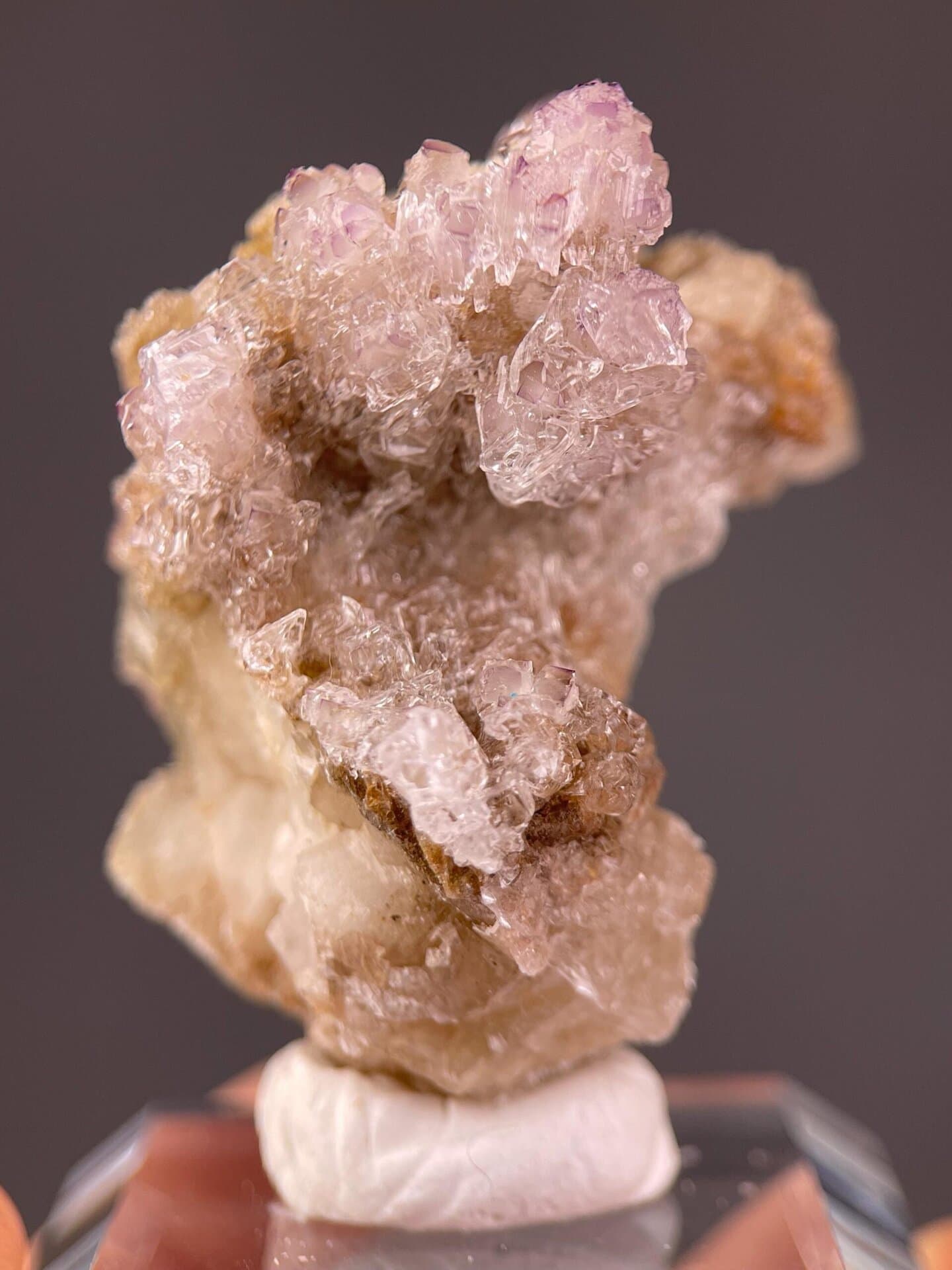 Light purple fluorite showing natural etching on crystal faces