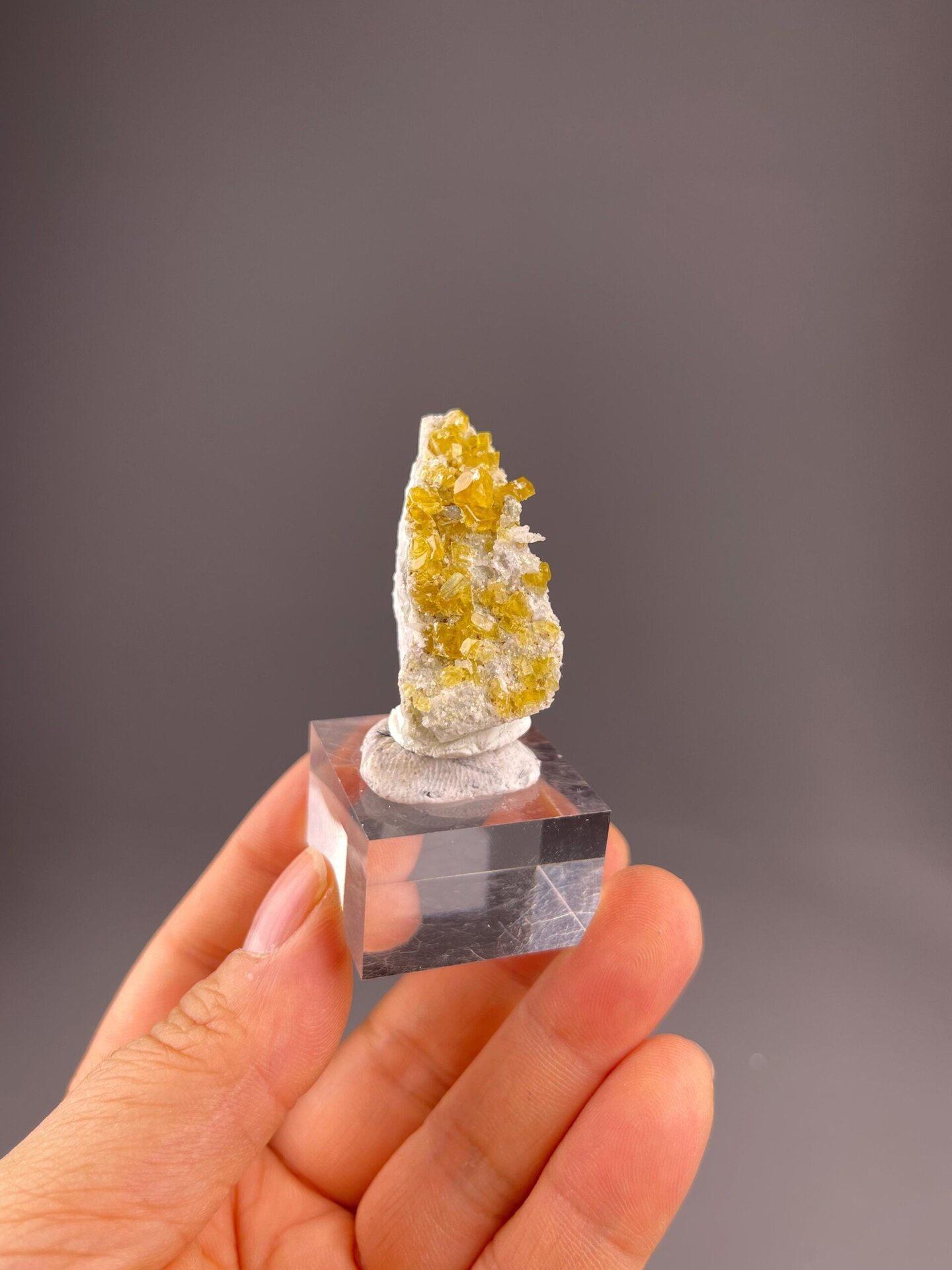 Close-up of intergrown yellow fluorite cubic crystals