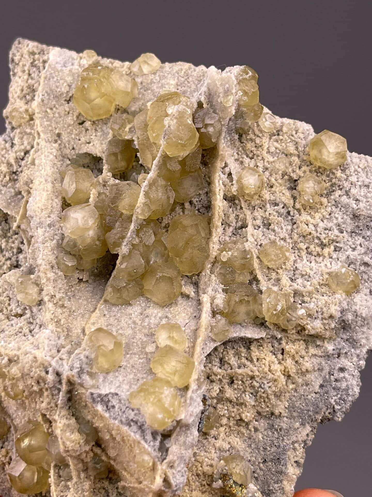 Yellow calcite scalenohedral crystals close-up