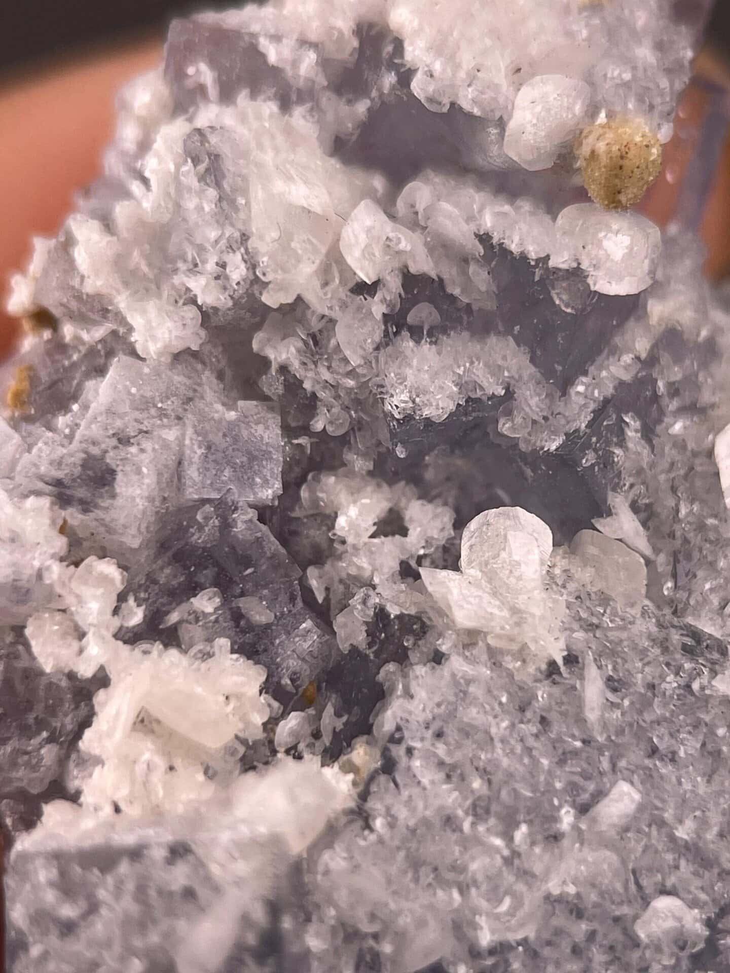 Angled view of blue cubic fluorite with calcite