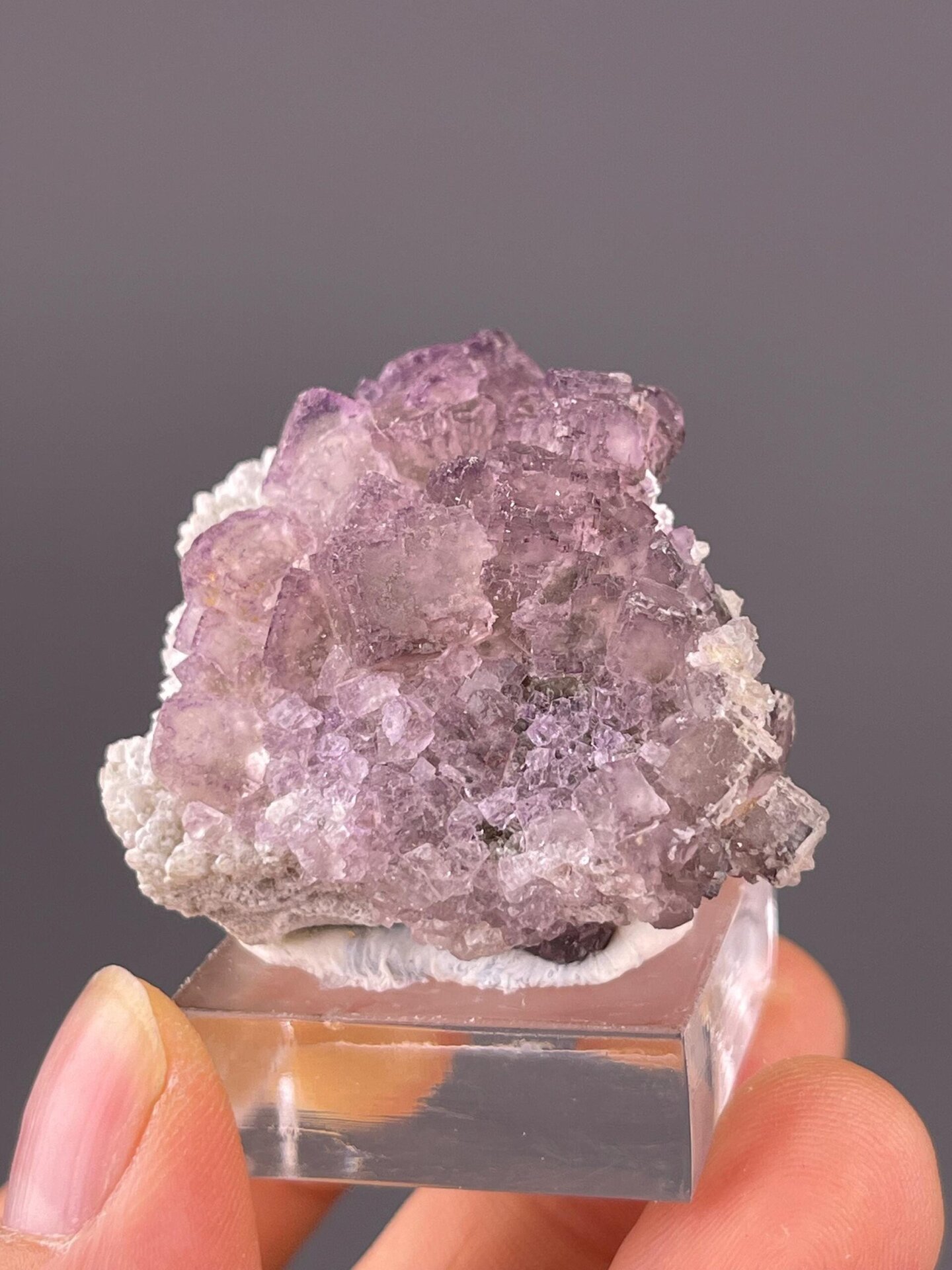 Elongated purple fluorite cluster Guizhou China front view