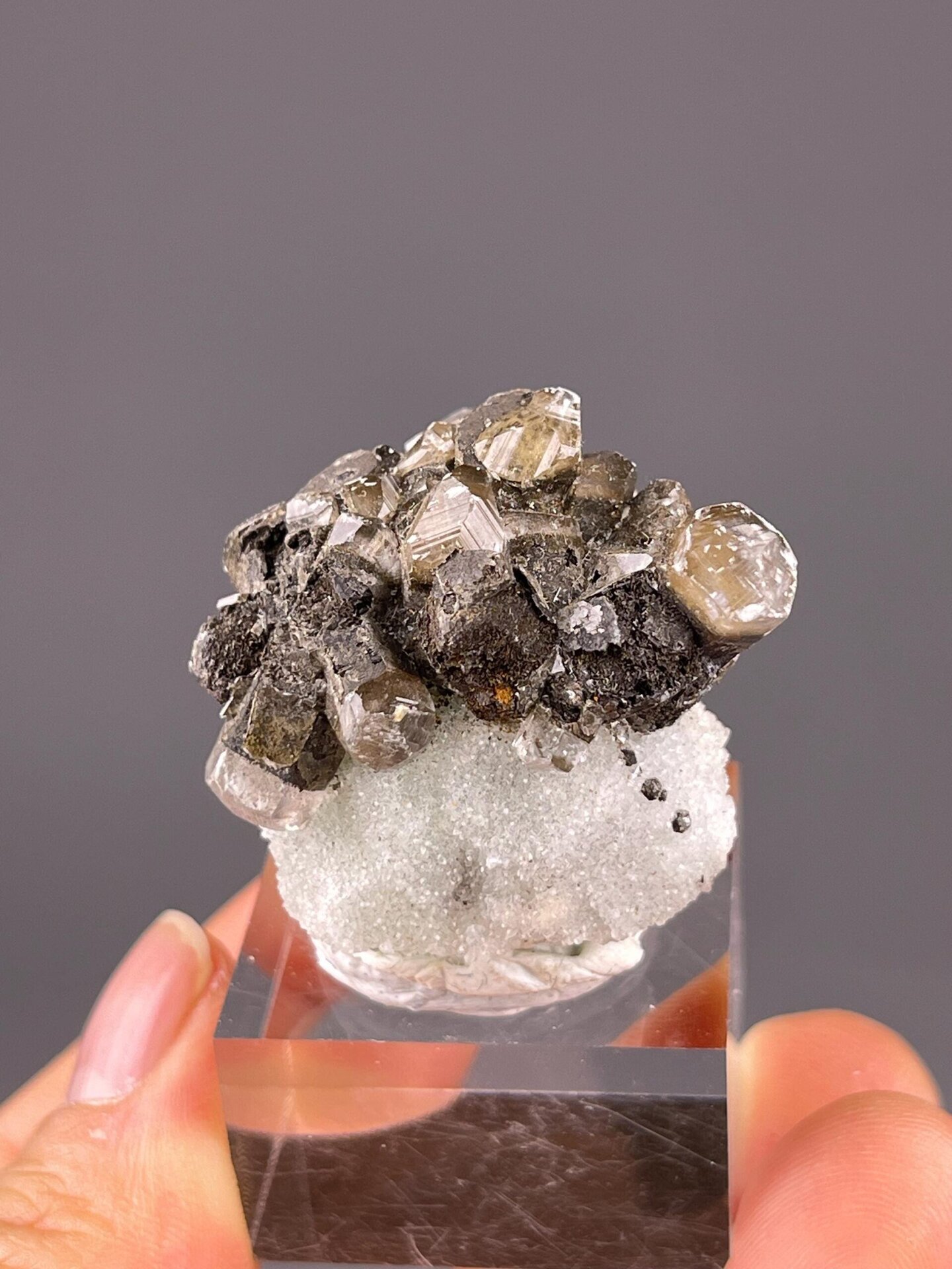 Close-up of green fluorite crystals on skarn matrix