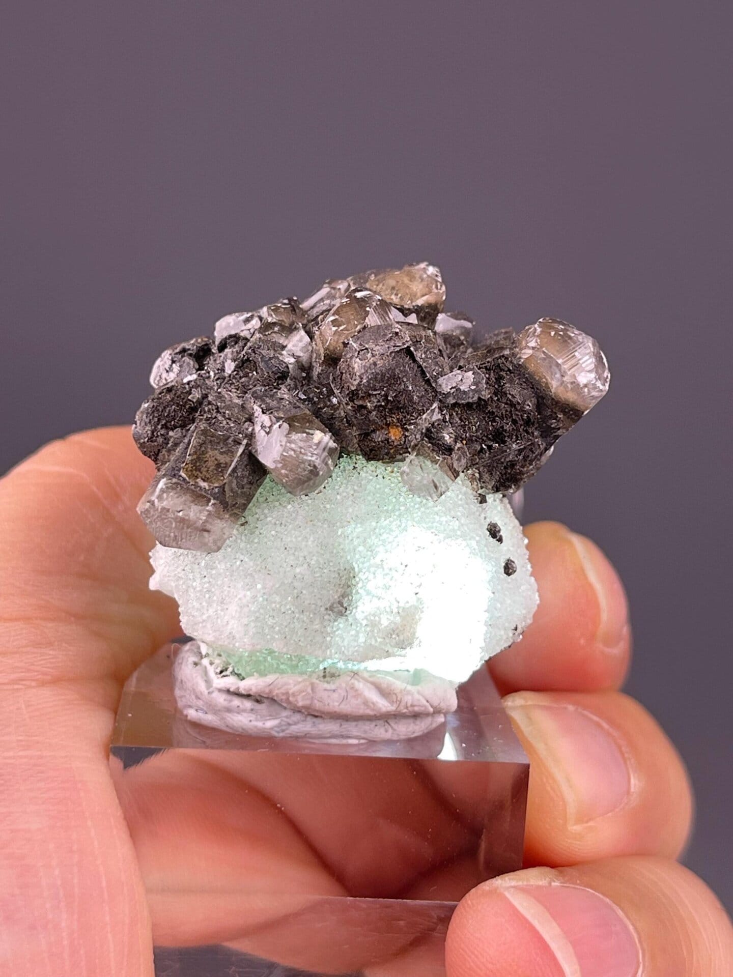 Side view of green fluorite quartz calcite specimen